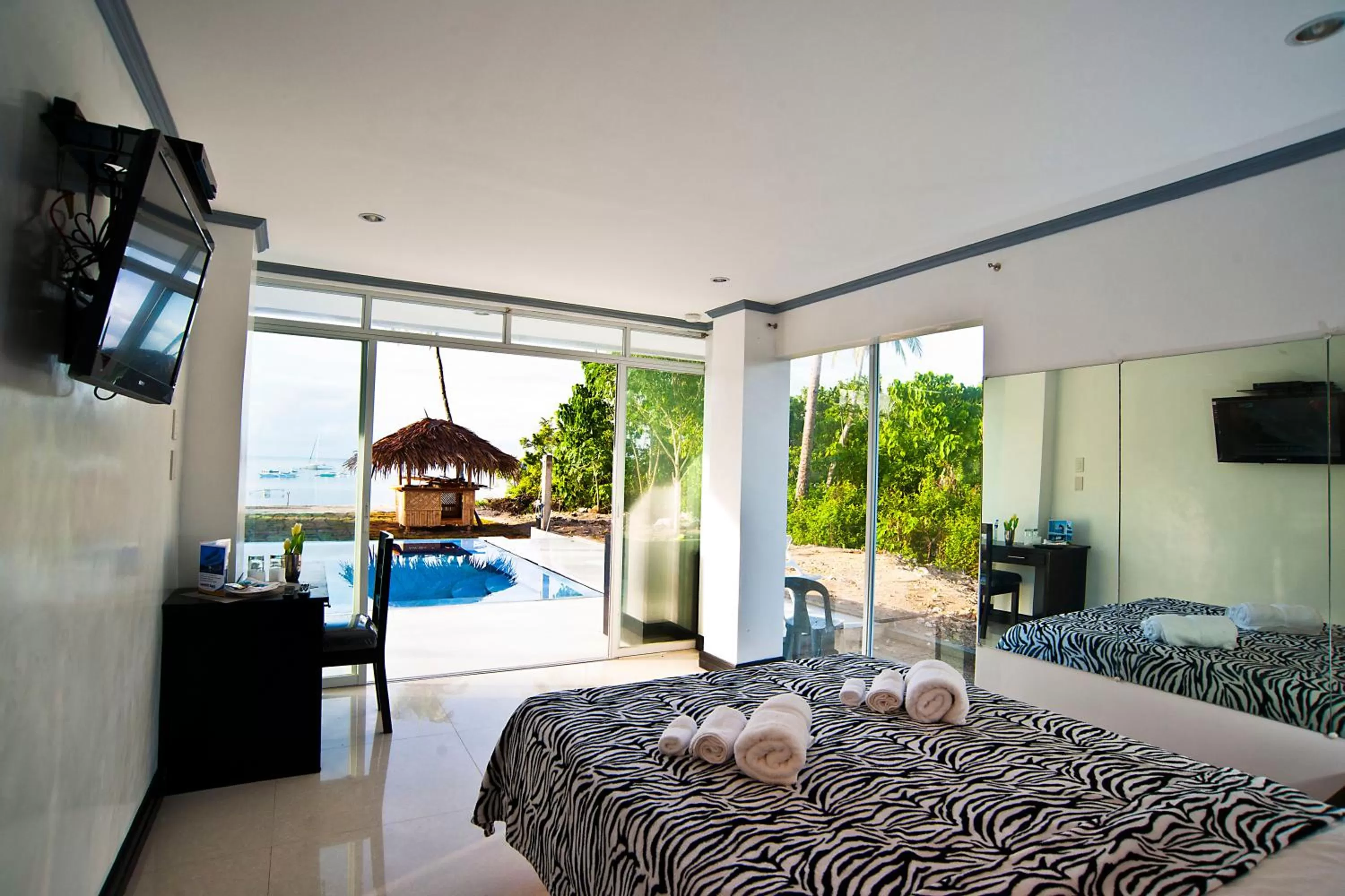 View (from property/room), Bed in Bohol South Beach Hotel