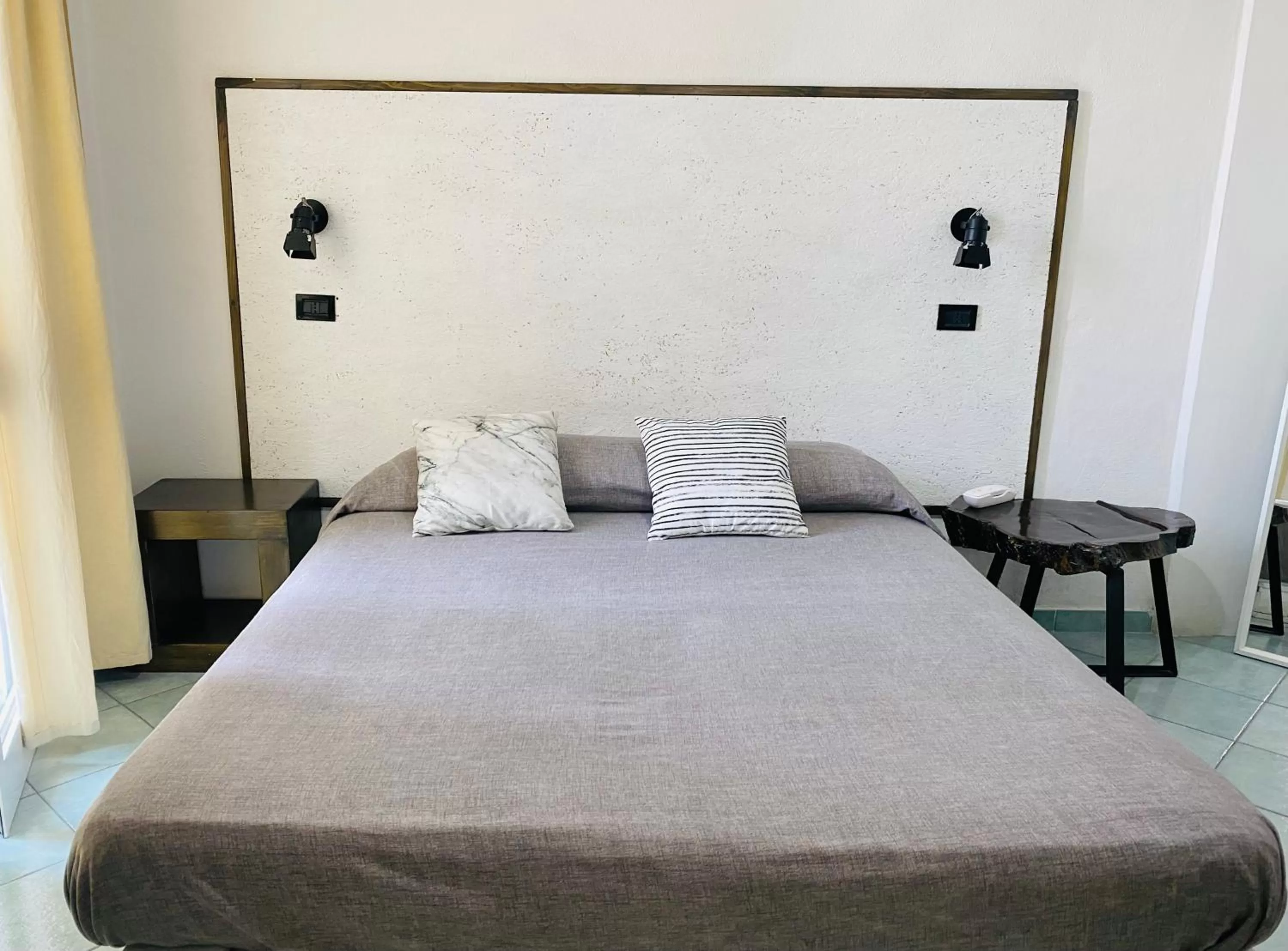 Bed in Black Market Hotel