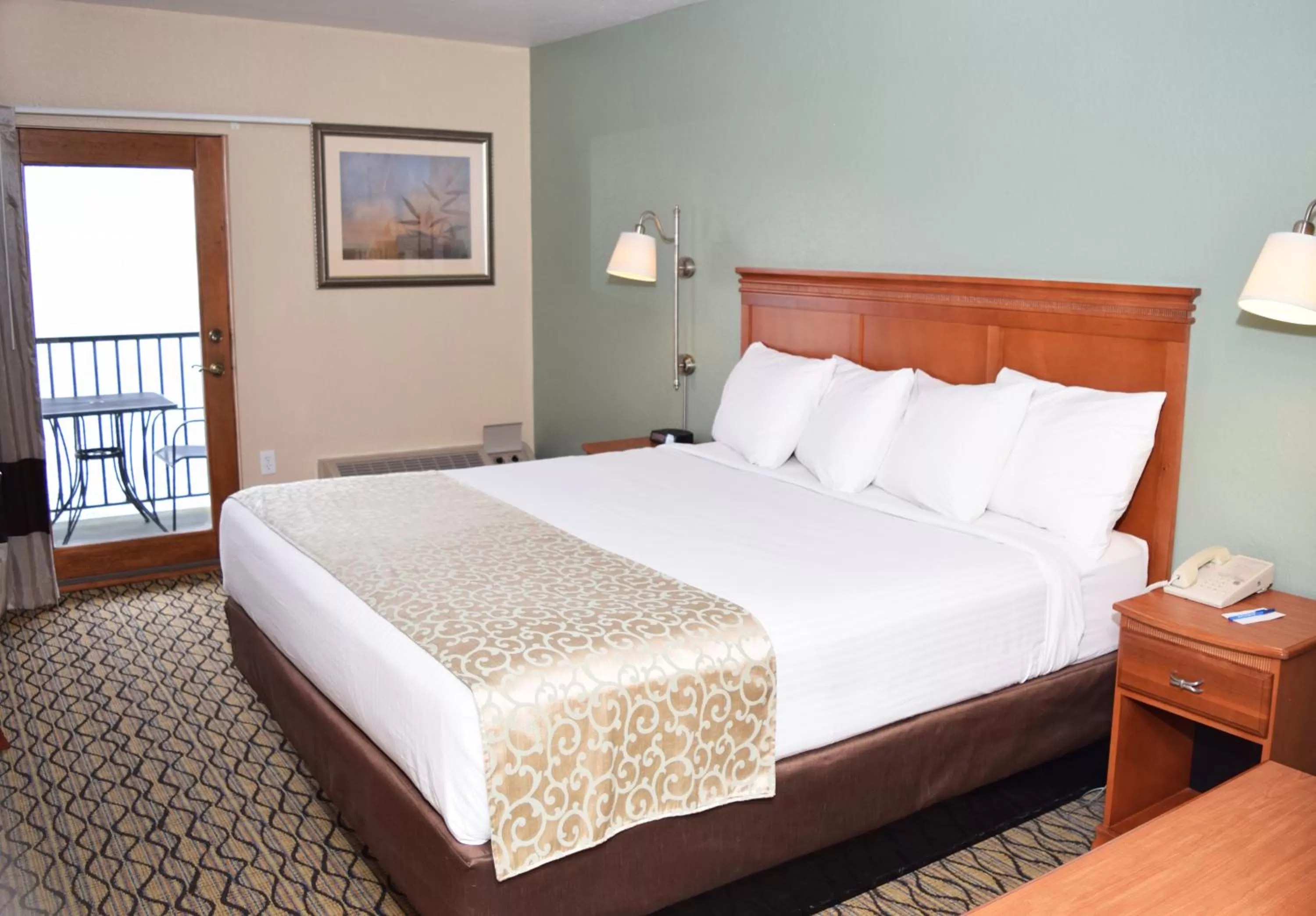 King Bed Handicapped Bath Beach Walkout in Beachfront Hotel Houghton Lake