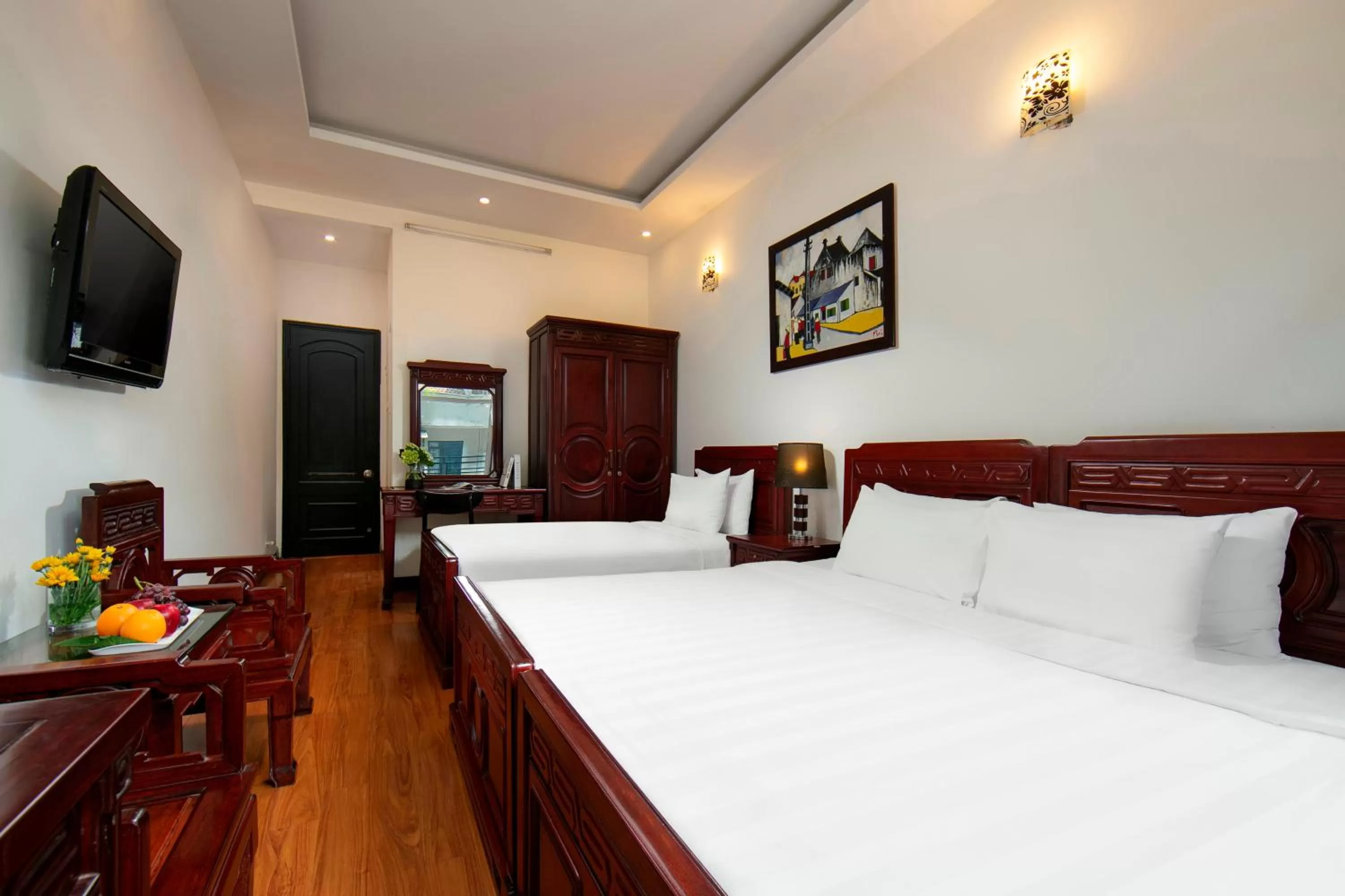 Communal lounge/ TV room, Bed in Bonjour Hanoi Hotel & Travel