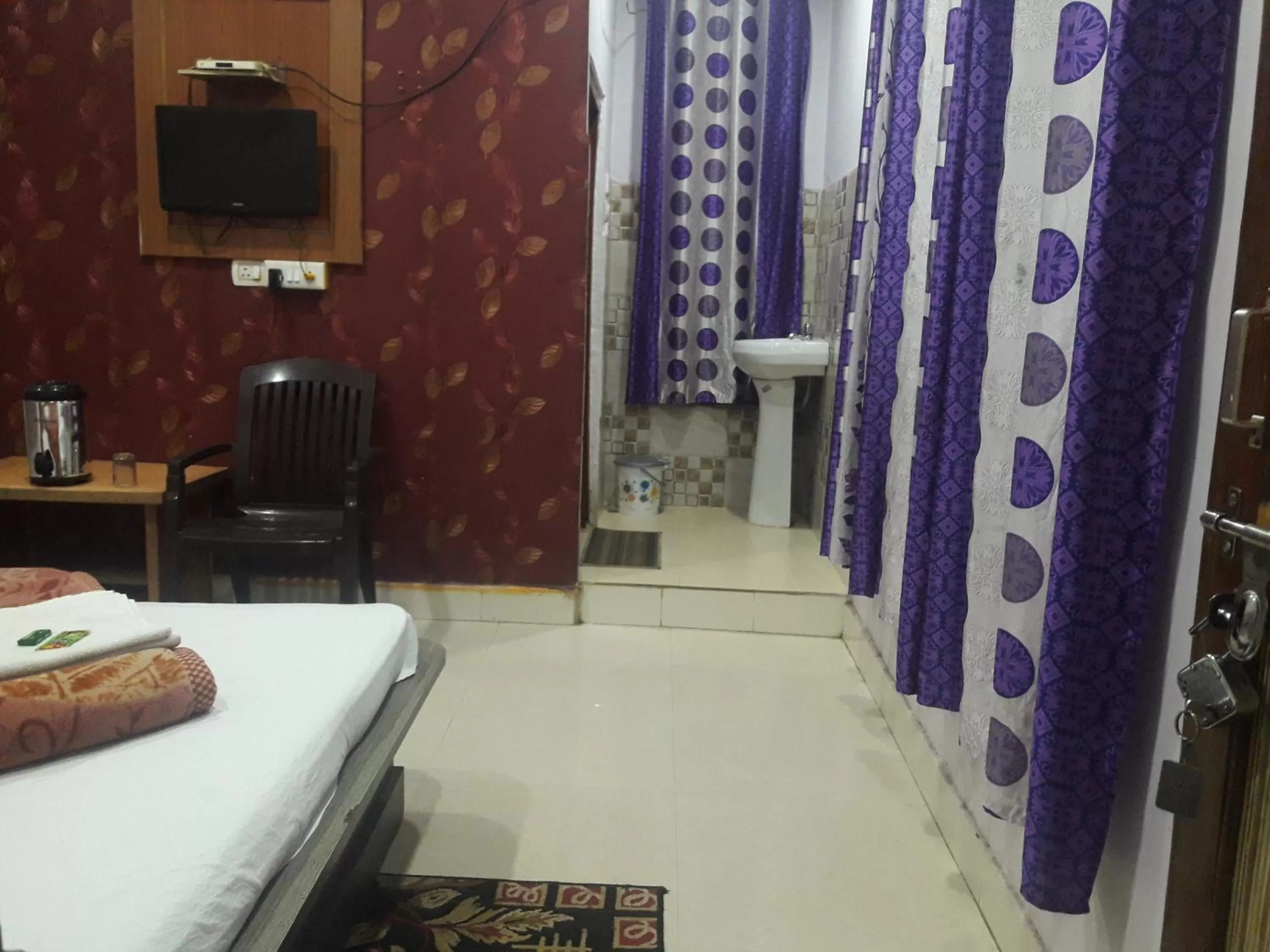 Photo of the whole room, TV/Entertainment Center in Hotel RAJVIHAR