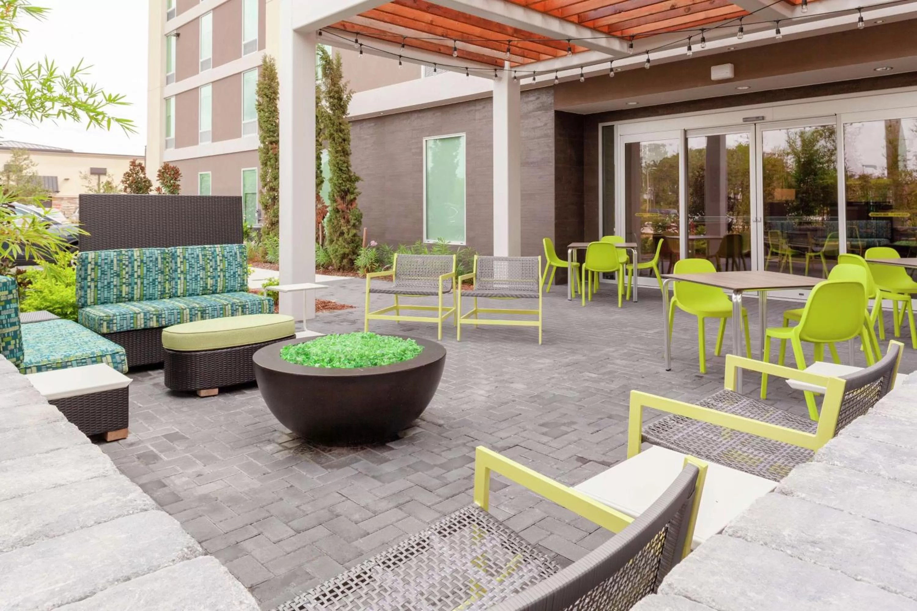 Patio in Home2 Suites By Hilton Orlando South Park - Near Epic Universe