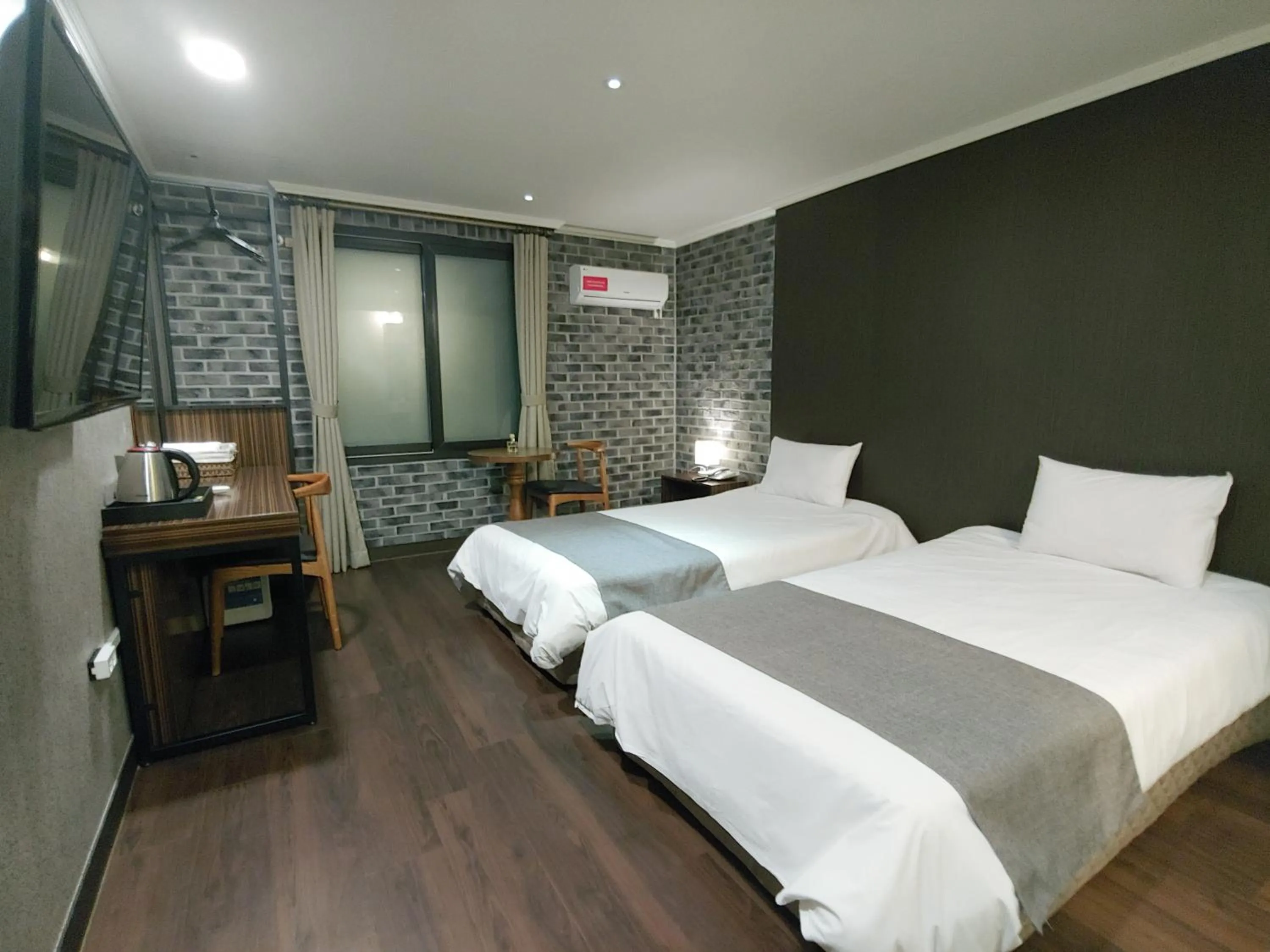 Bed in Hotel Tong Yeondong Jeju