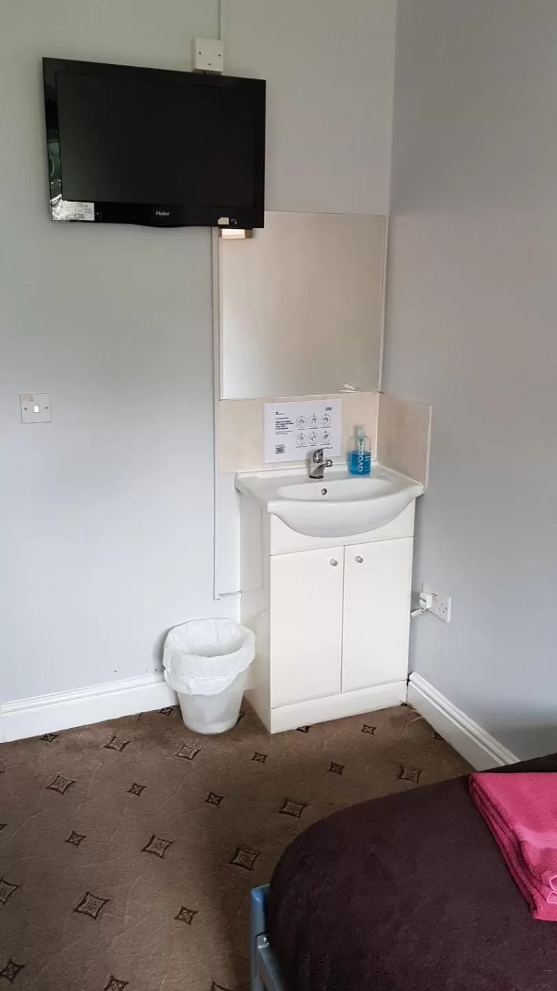 Bedroom in Hour Glass Hotel