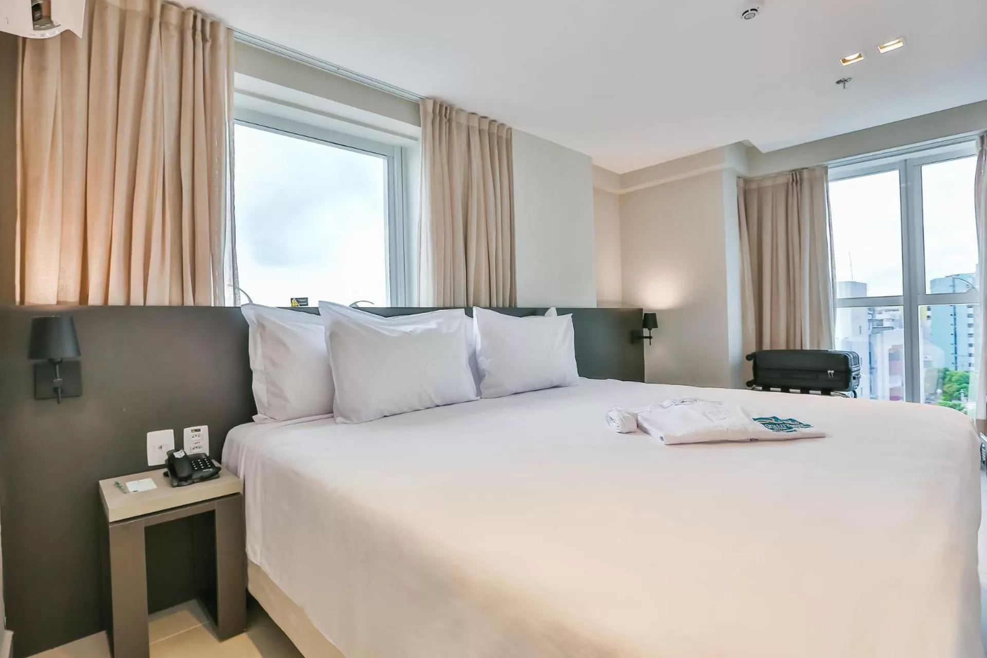 Bed in Quality Suítes João Pessoa