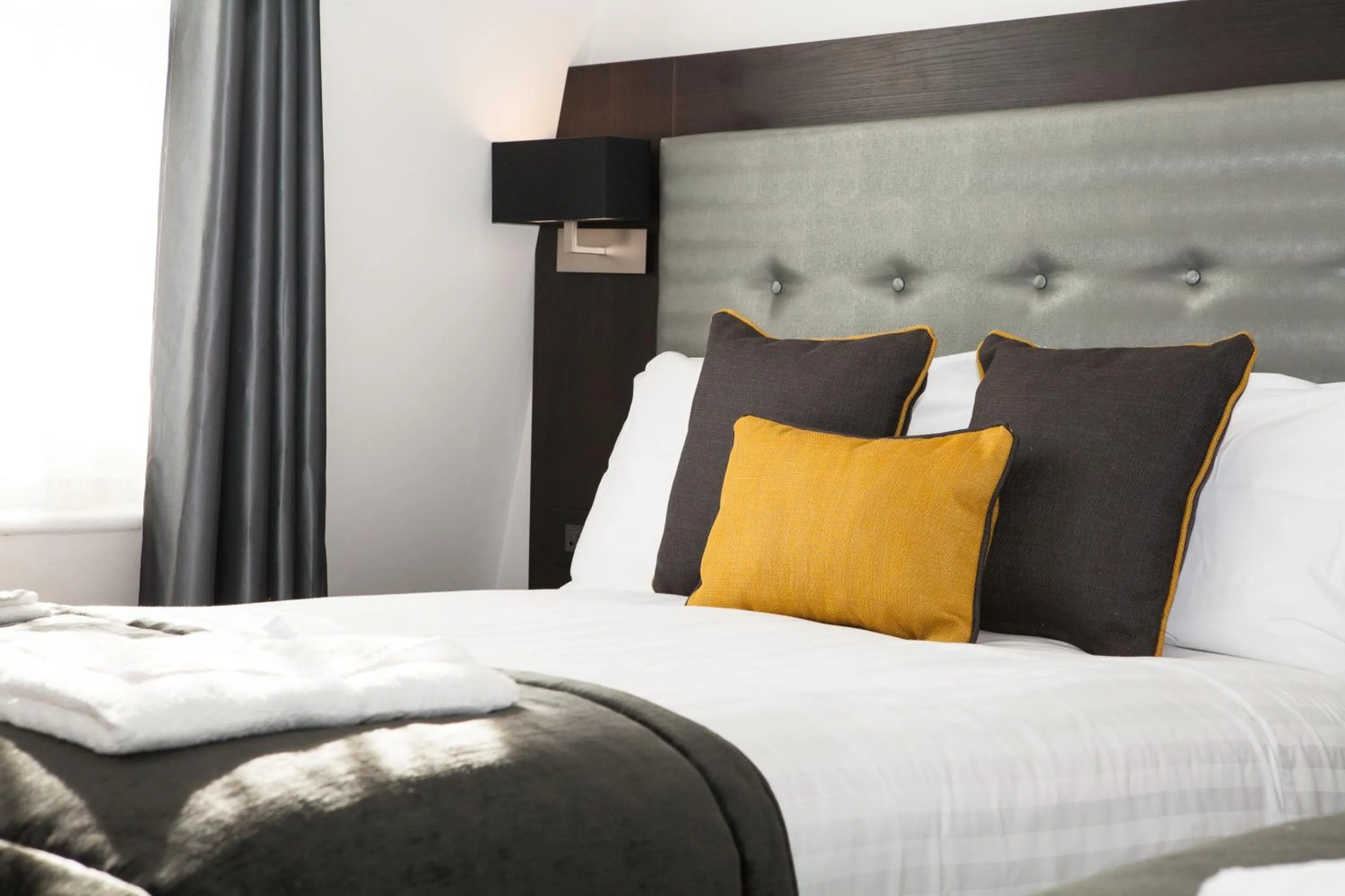 Photo of the whole room, Bed in The Tudor Inn Hotel