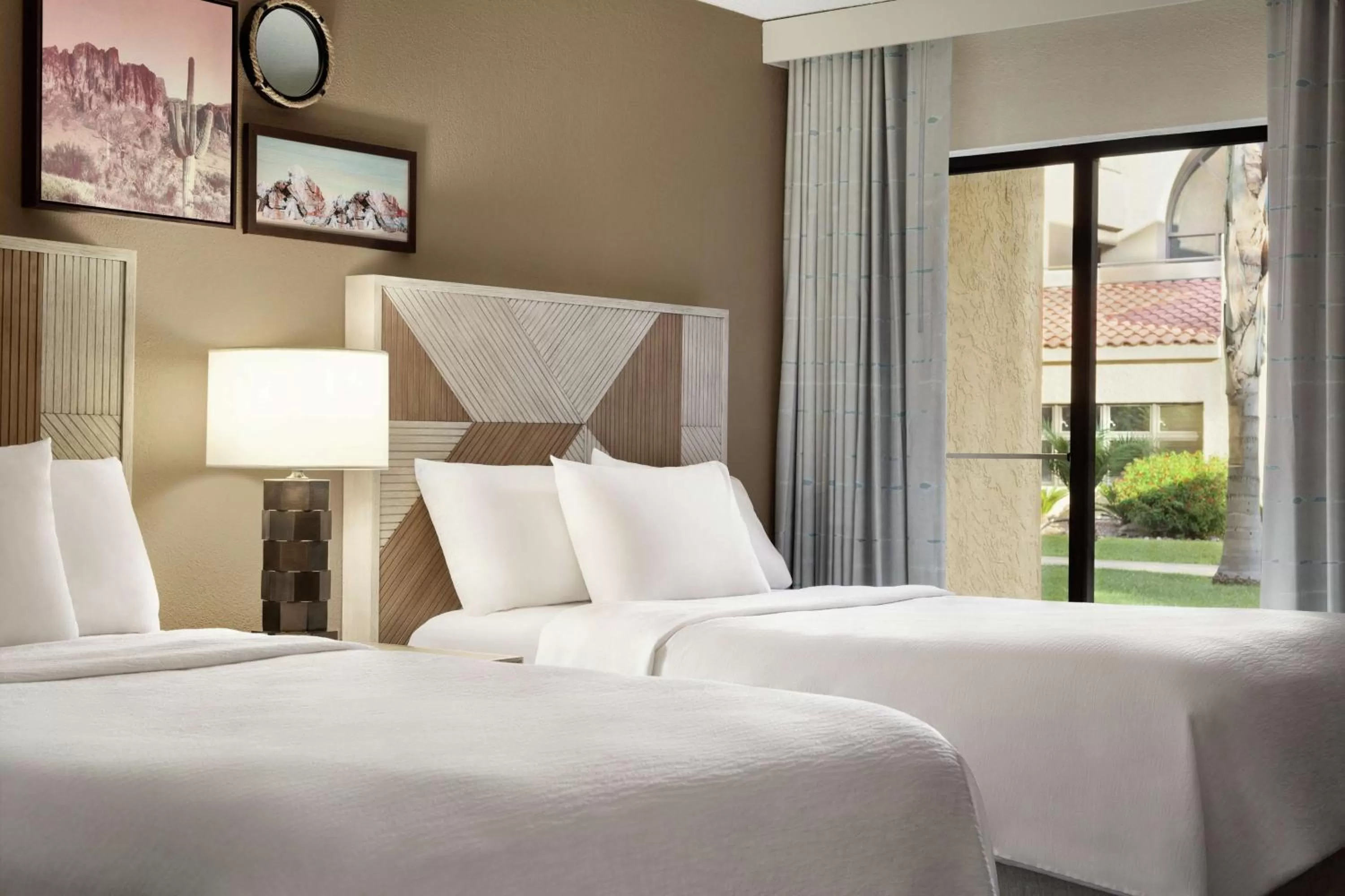 Bed in Embassy Suites by Hilton Phoenix Tempe