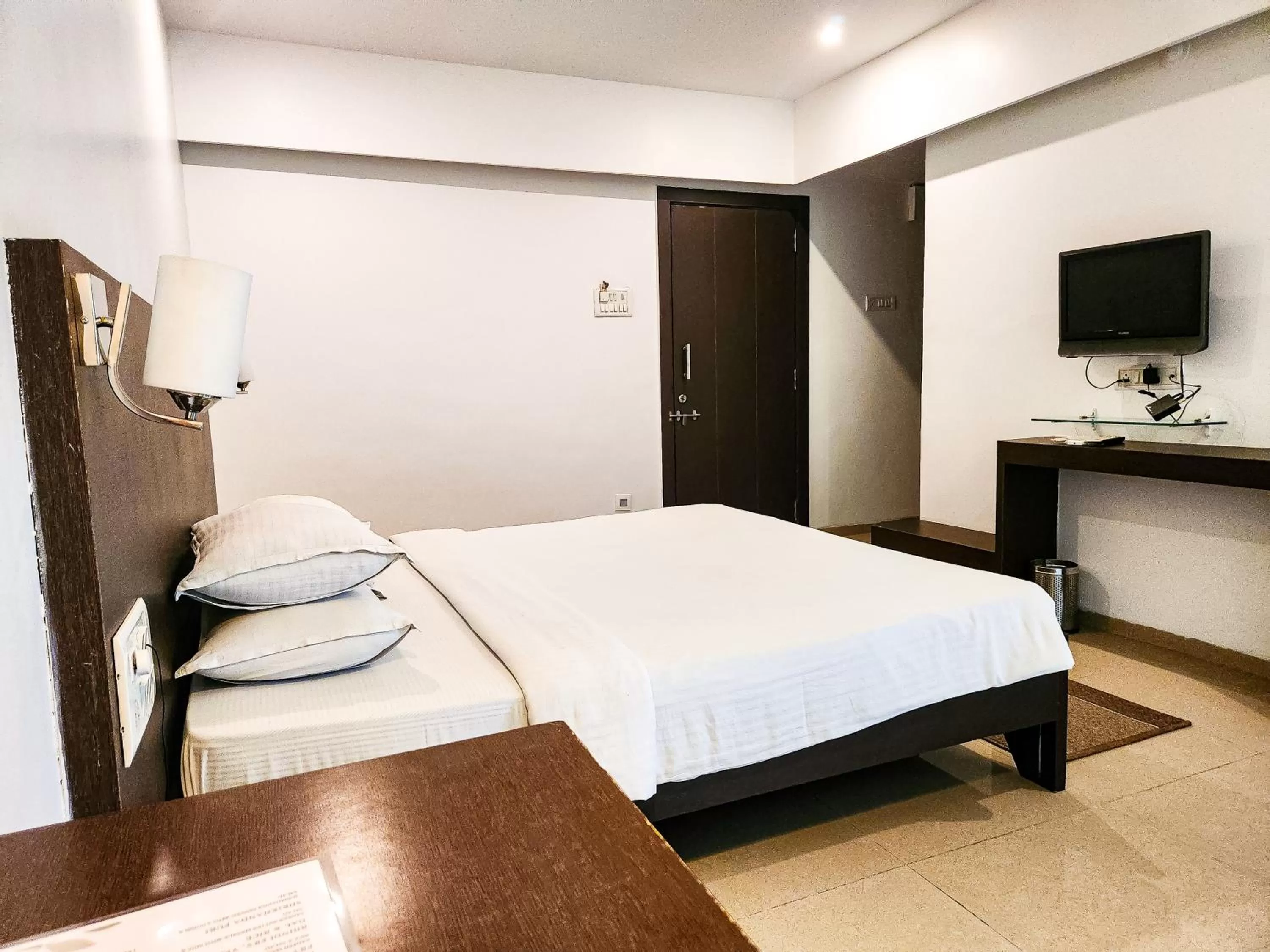 Bed in Hotel Rajwada Aurangabad