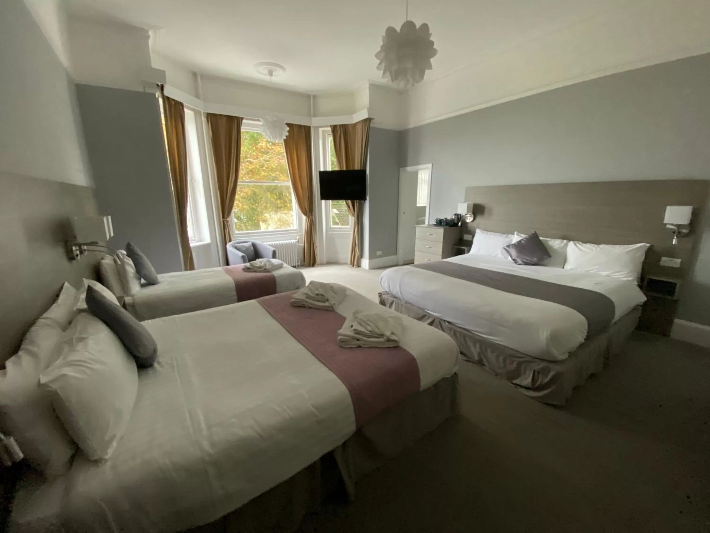 Photo of the whole room, Bed in Cottonwood Boutique