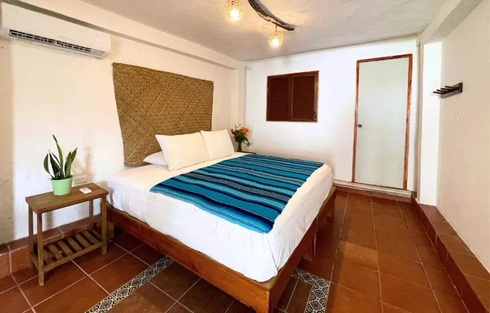 Bed in Hotel Villas Colibrí Suites & Bungalows