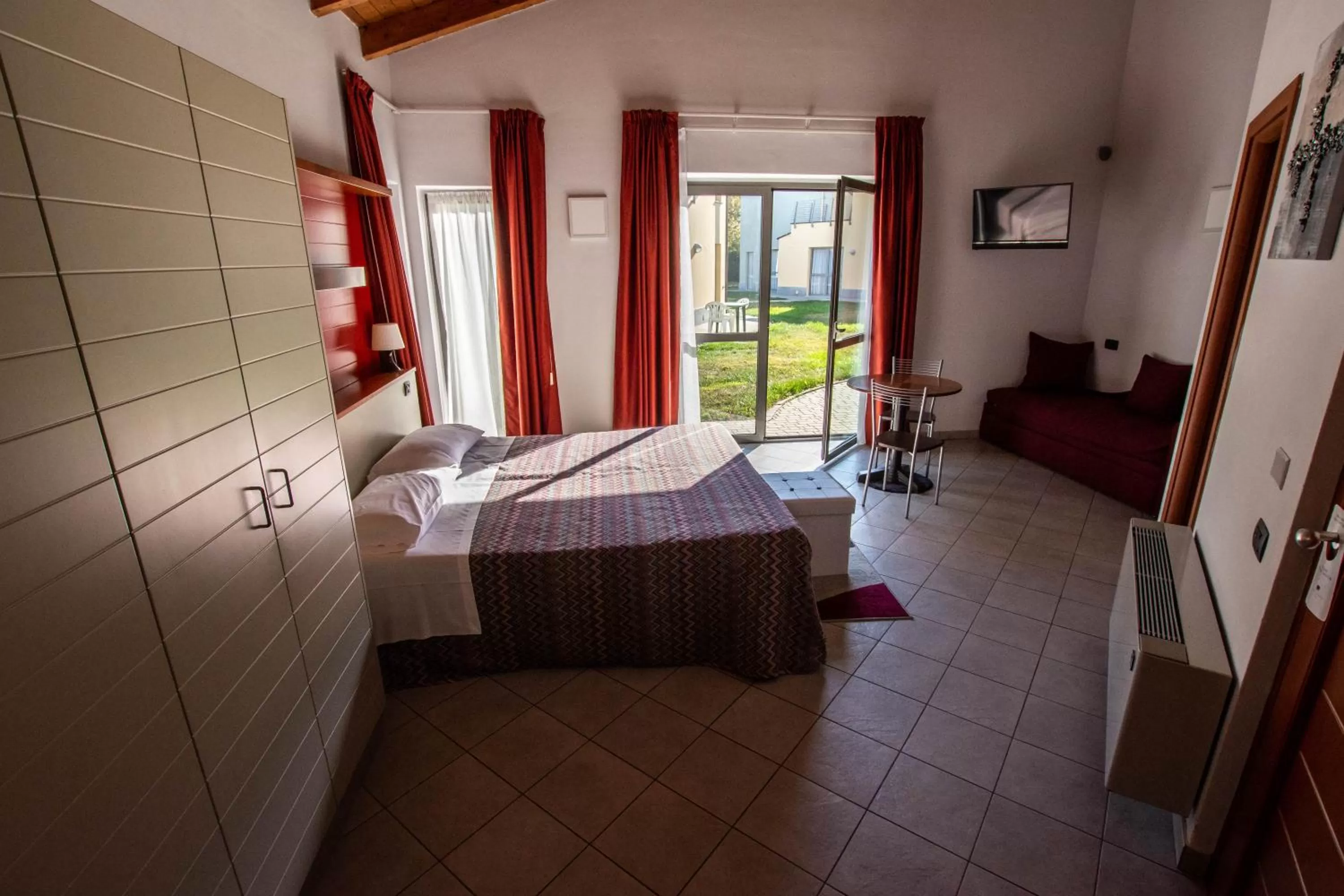 Bed in Albavillage Rooms & Camping