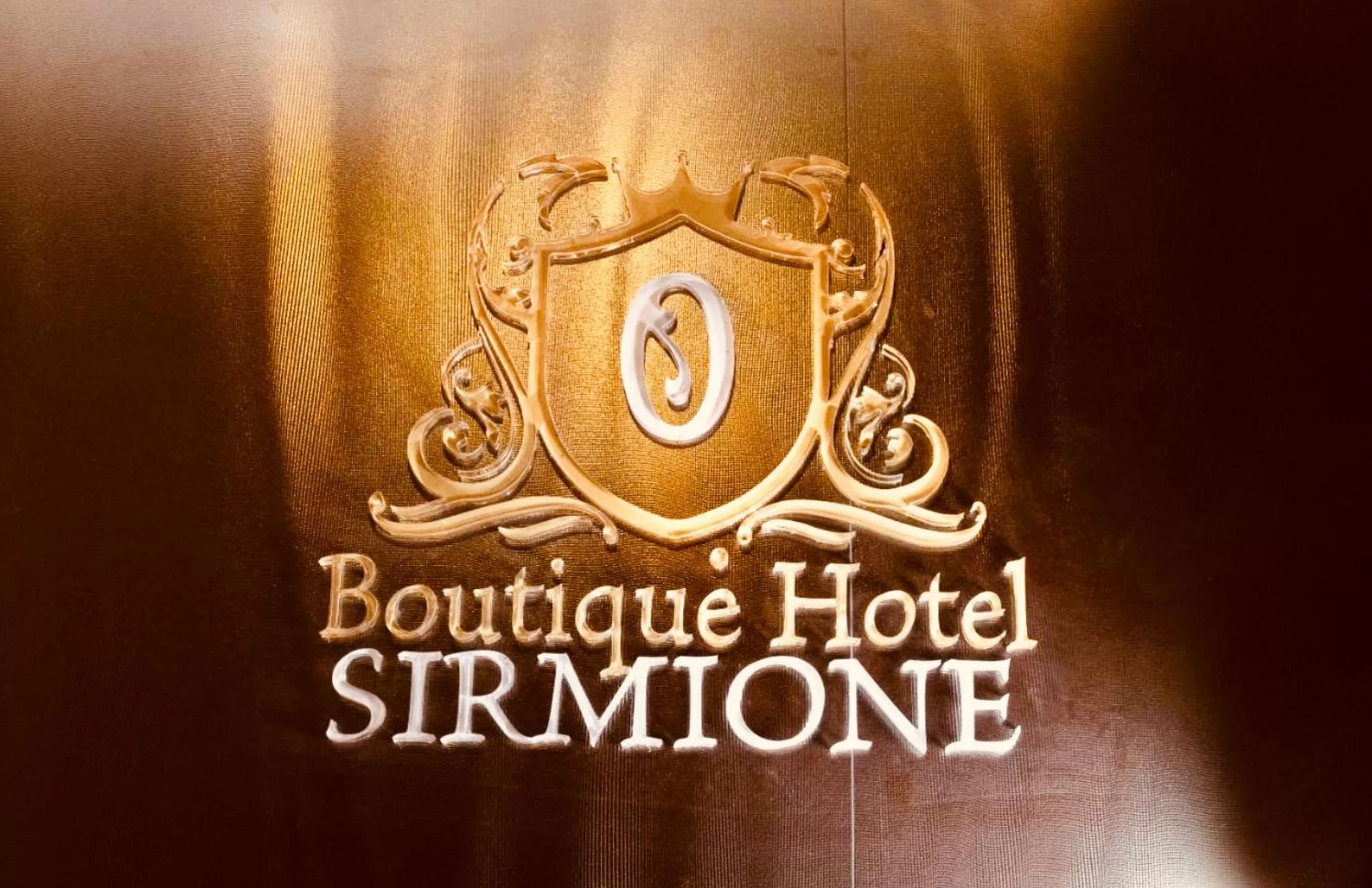 Property logo or sign in Boutique Hotel Sirmione