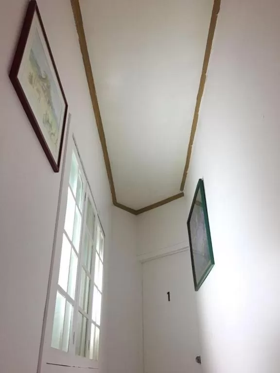 Property building, TV/Entertainment Center in SURA