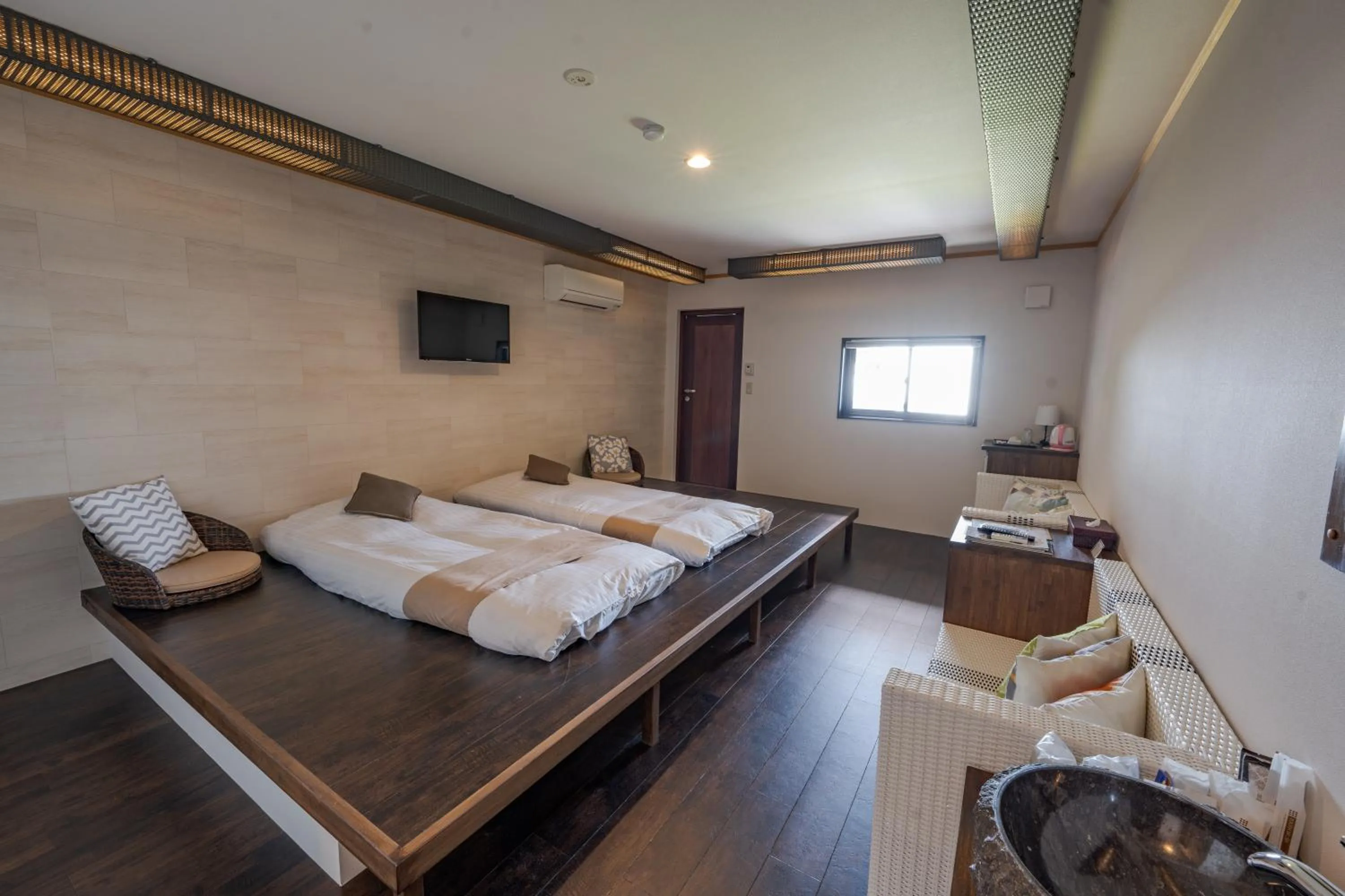 Bed in XYZ Private Spa and Seaside Resort