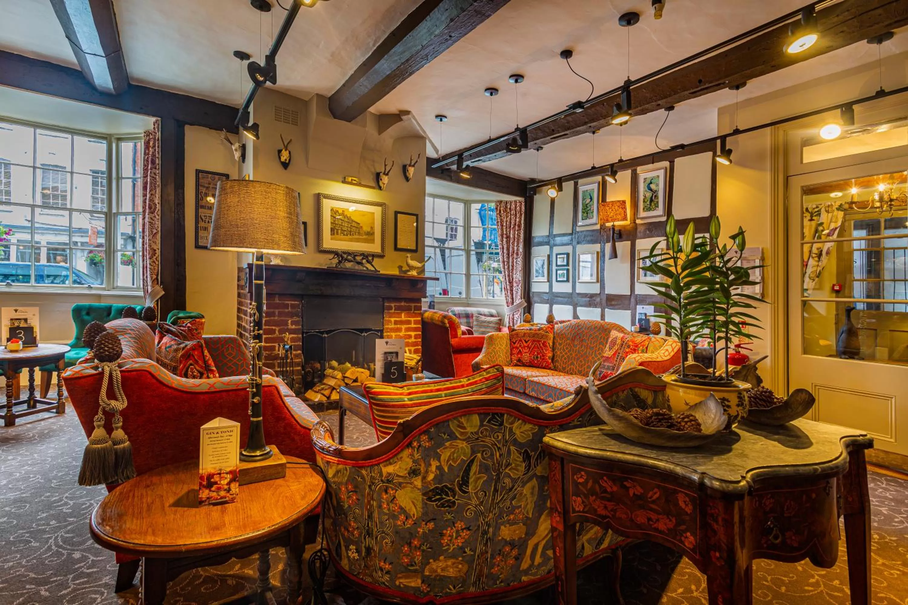 Communal lounge/ TV room in The Feathers Hotel, Ledbury - The Coaching Inn Group