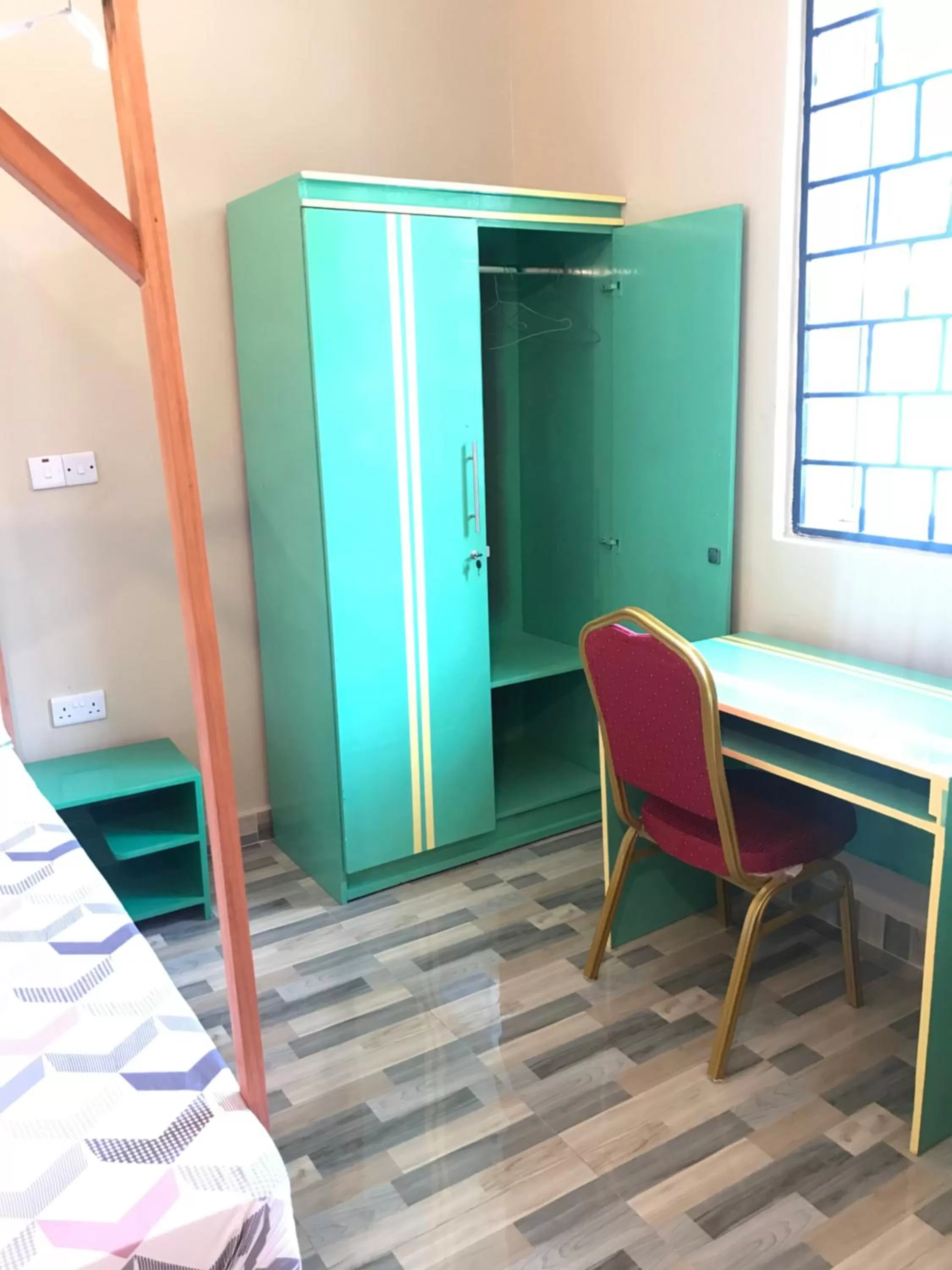 Bedroom in L&J Modern Backpackers Kinondoni