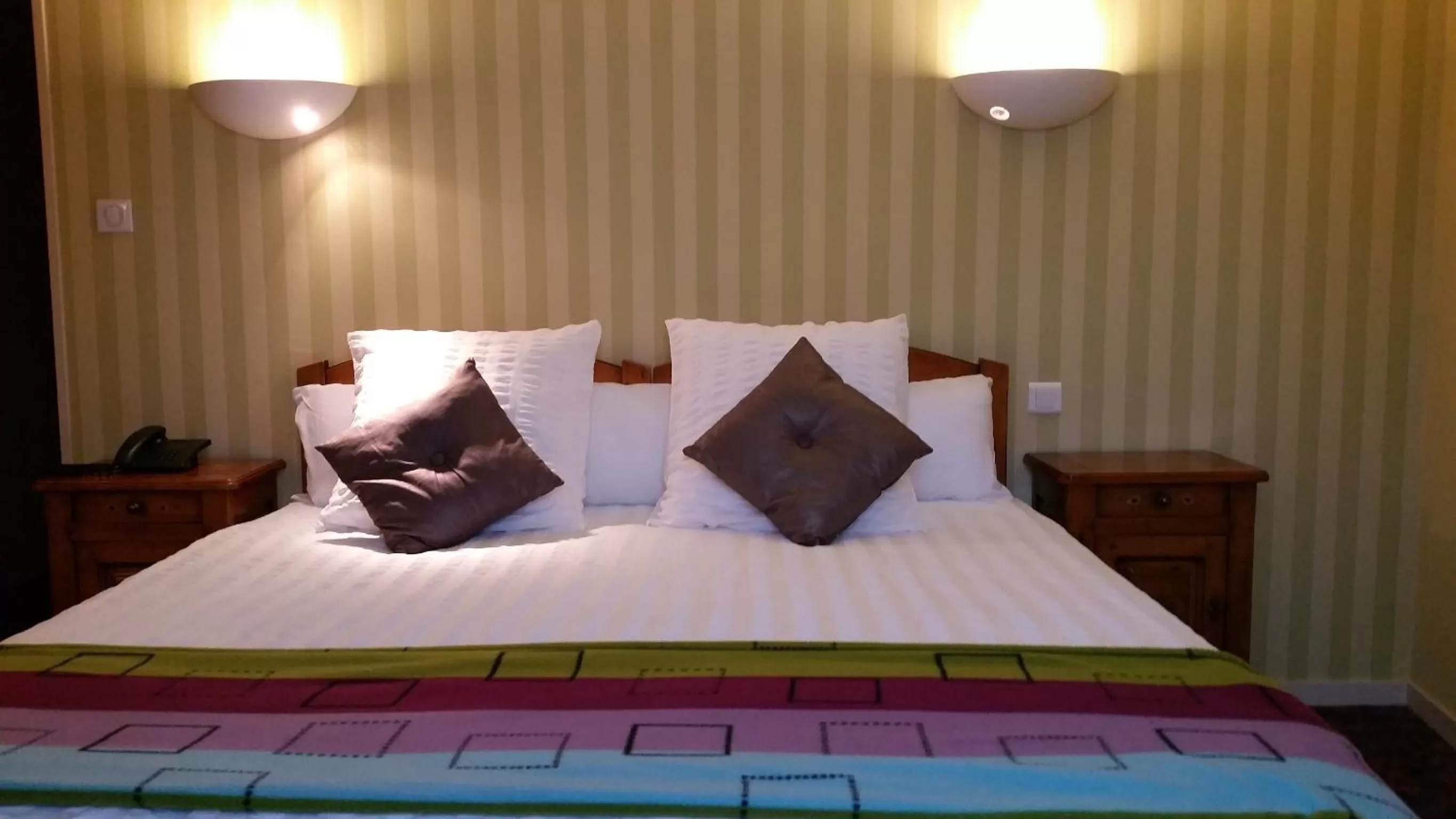 Bedroom in Logis Hôtel de la Tête Noire