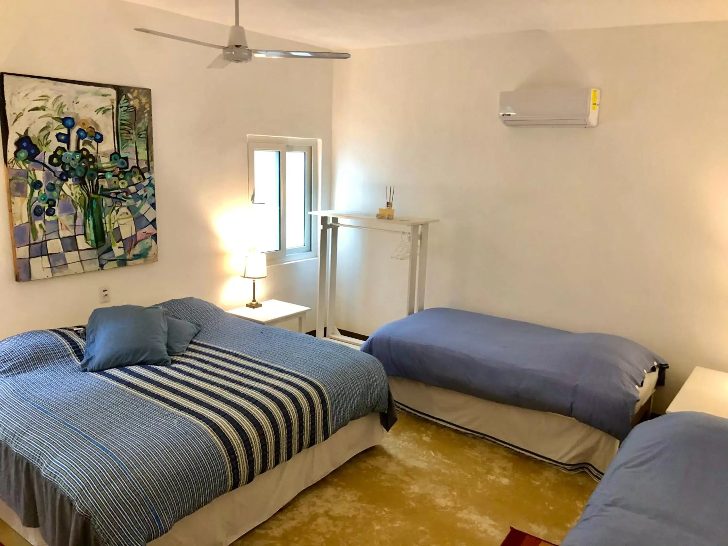 Bed in Junto al Rio Bungalows & Suites Bed in Junto al Rio Bungalows & Suites