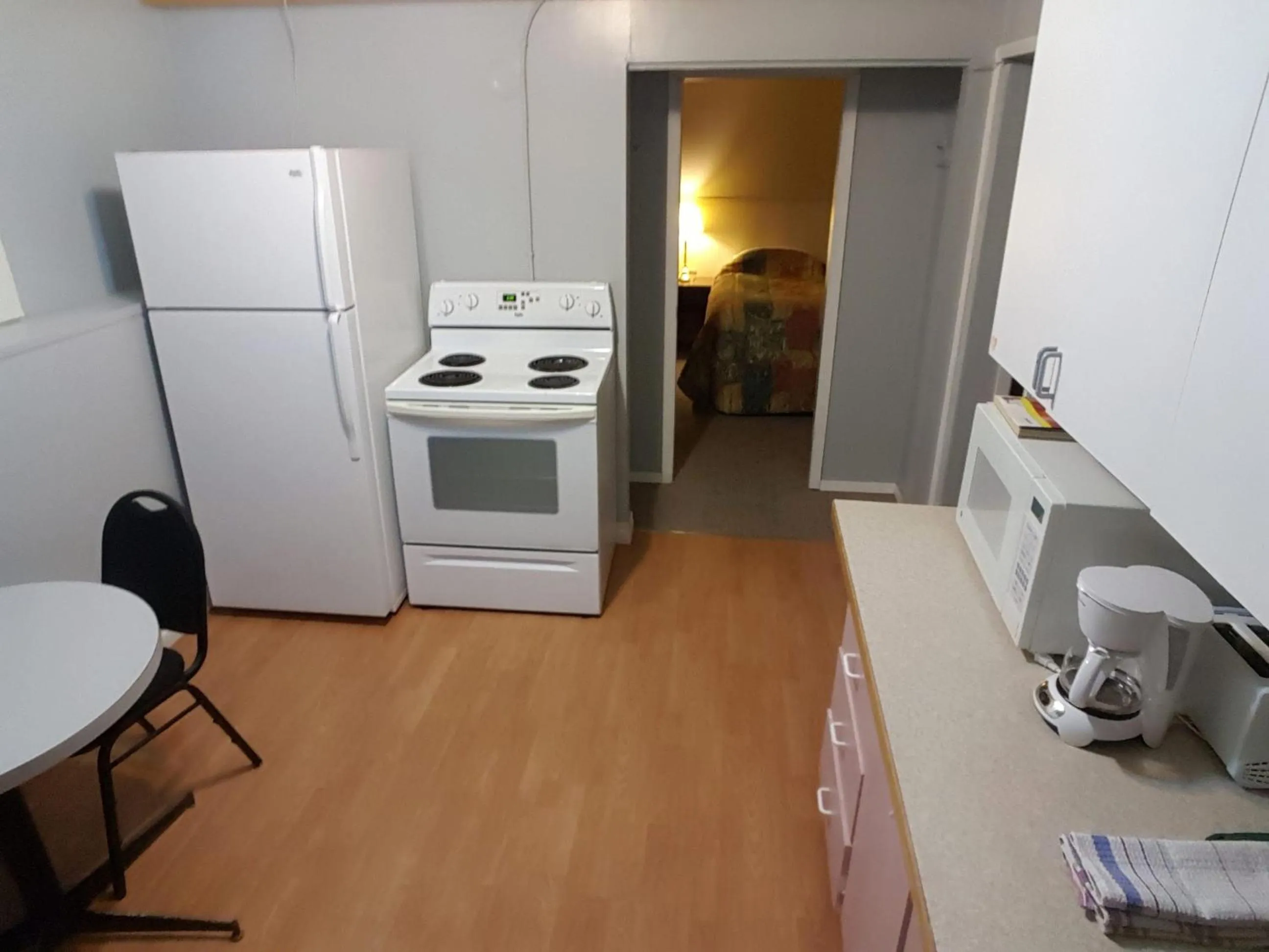 Kitchen or kitchenette in Centennial Motel