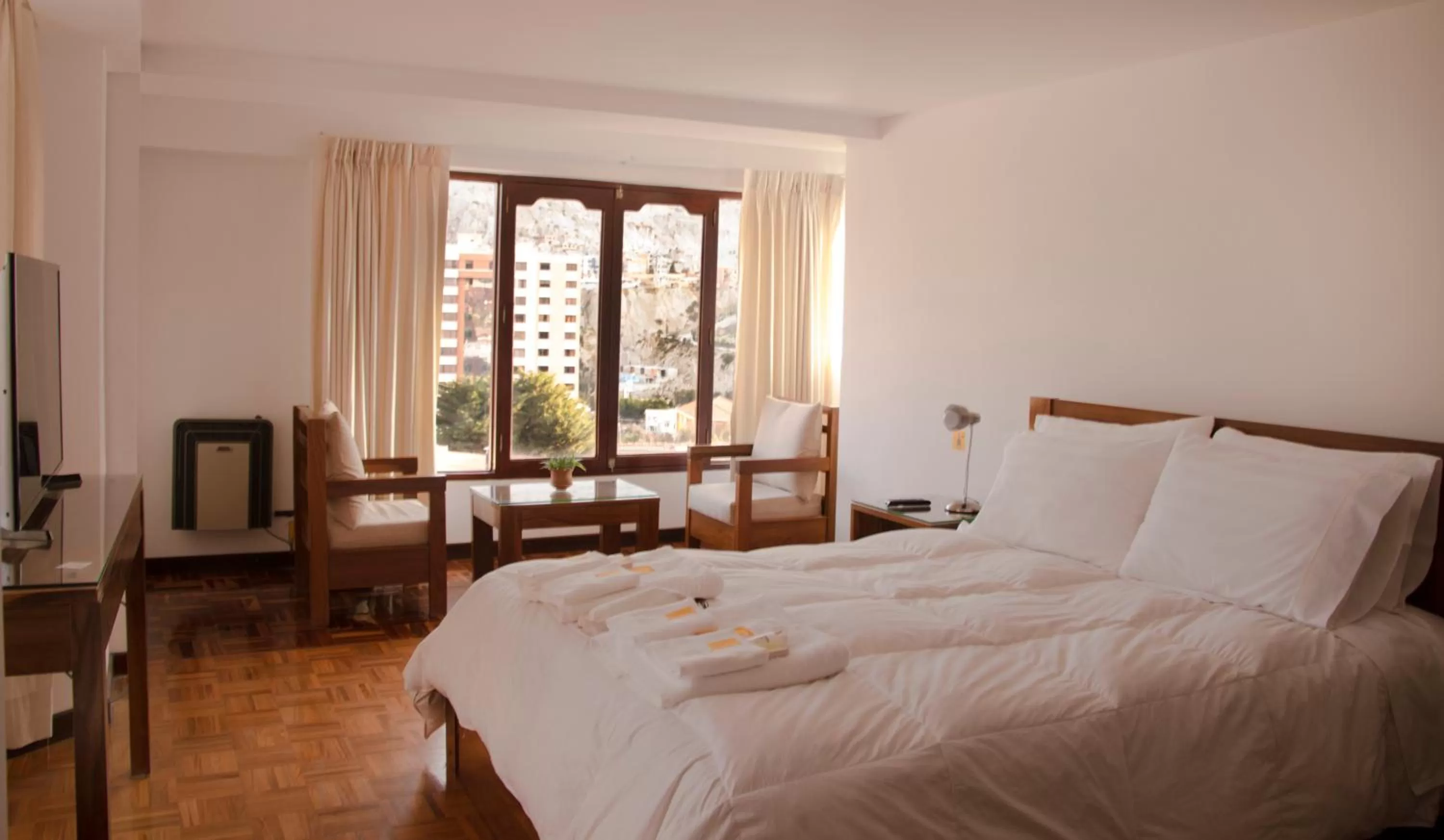 Bed in Qhini Hotel Boutique