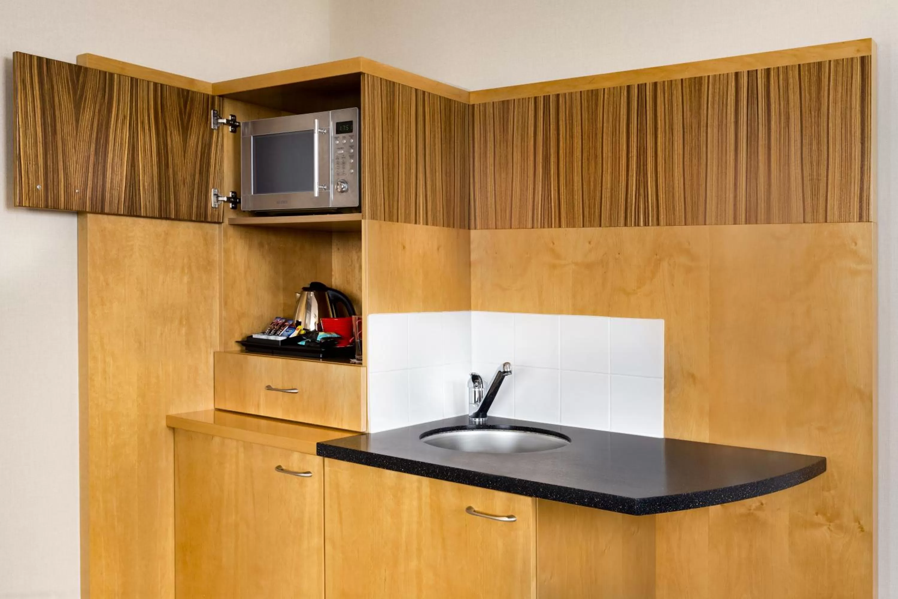 Kitchen or kitchenette in Ramada Hotel & Suites by Wyndham Coventry