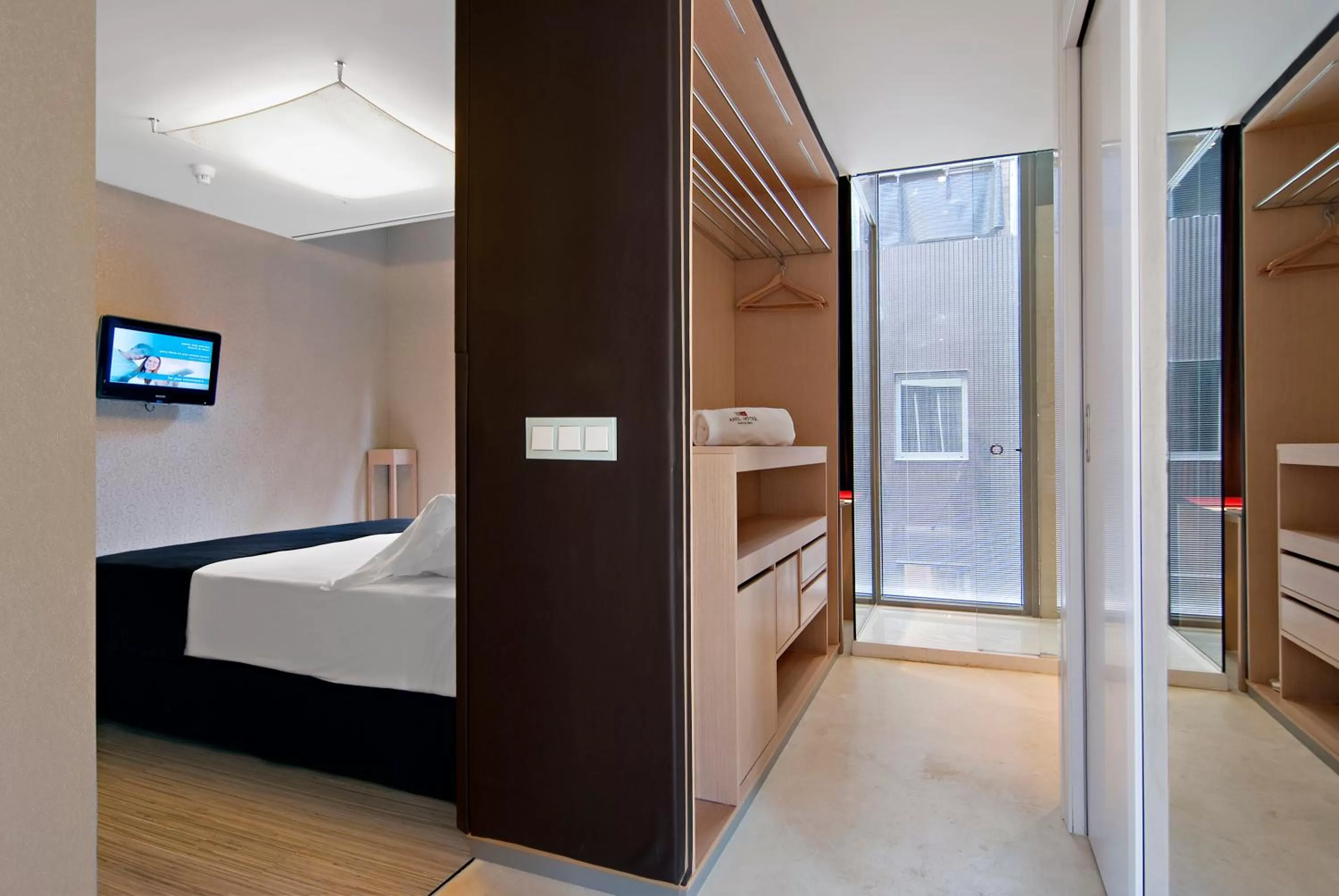 Photo of the whole room, Bed in Axel Hotel Barcelona - Adults Only