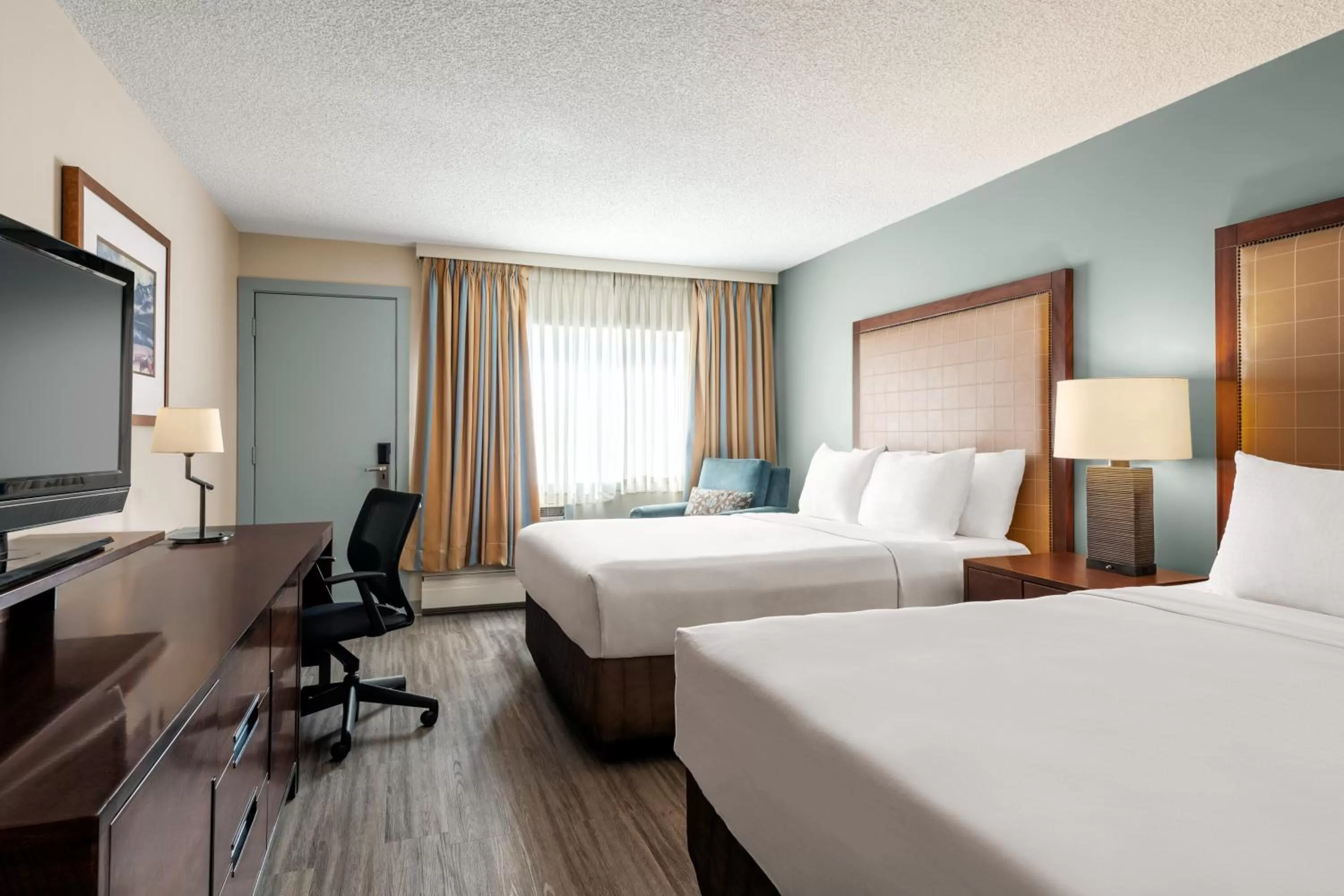 Bedroom in Travelodge by Wyndham Calgary South