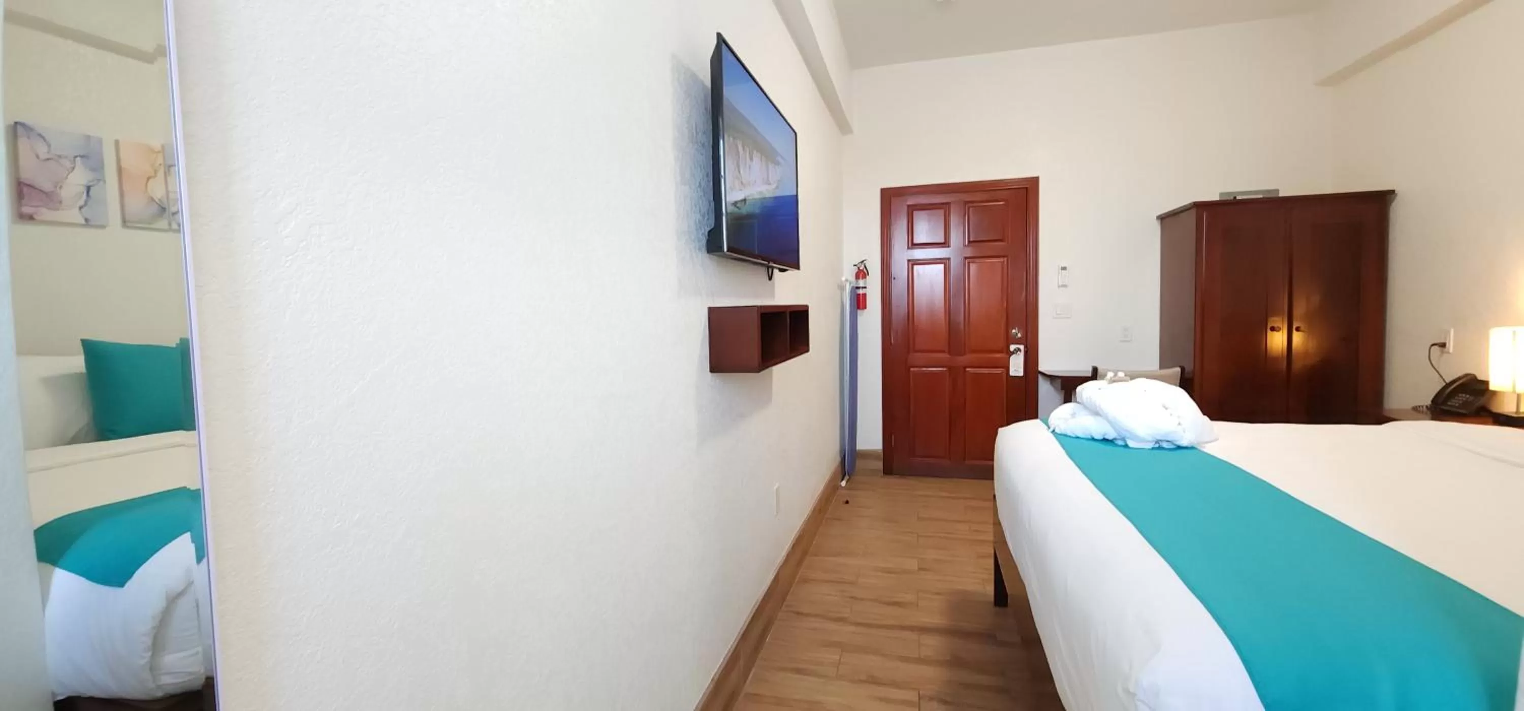 Bed in Voyager Sun & Reef Hotel