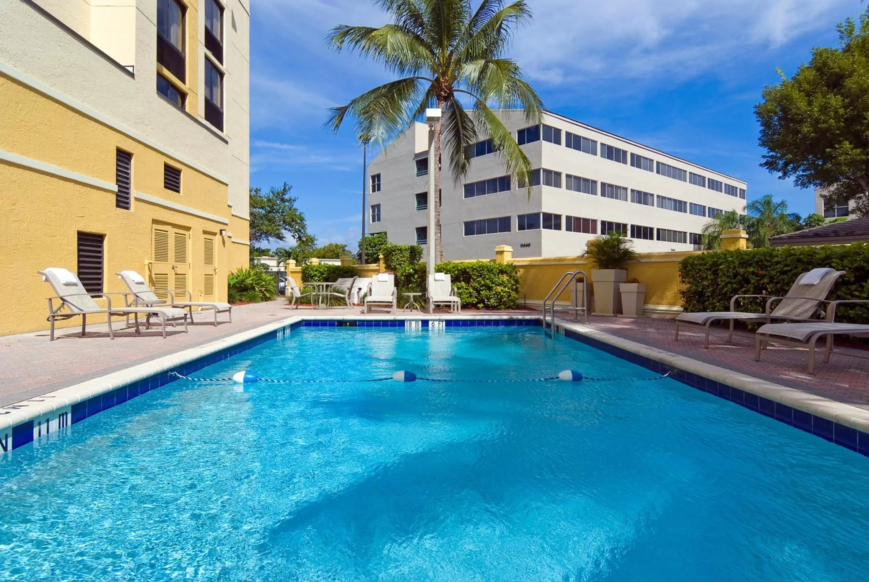 Swimming pool in Holiday Inn Express Hotel & Suites Kendall East-Miami by IHG