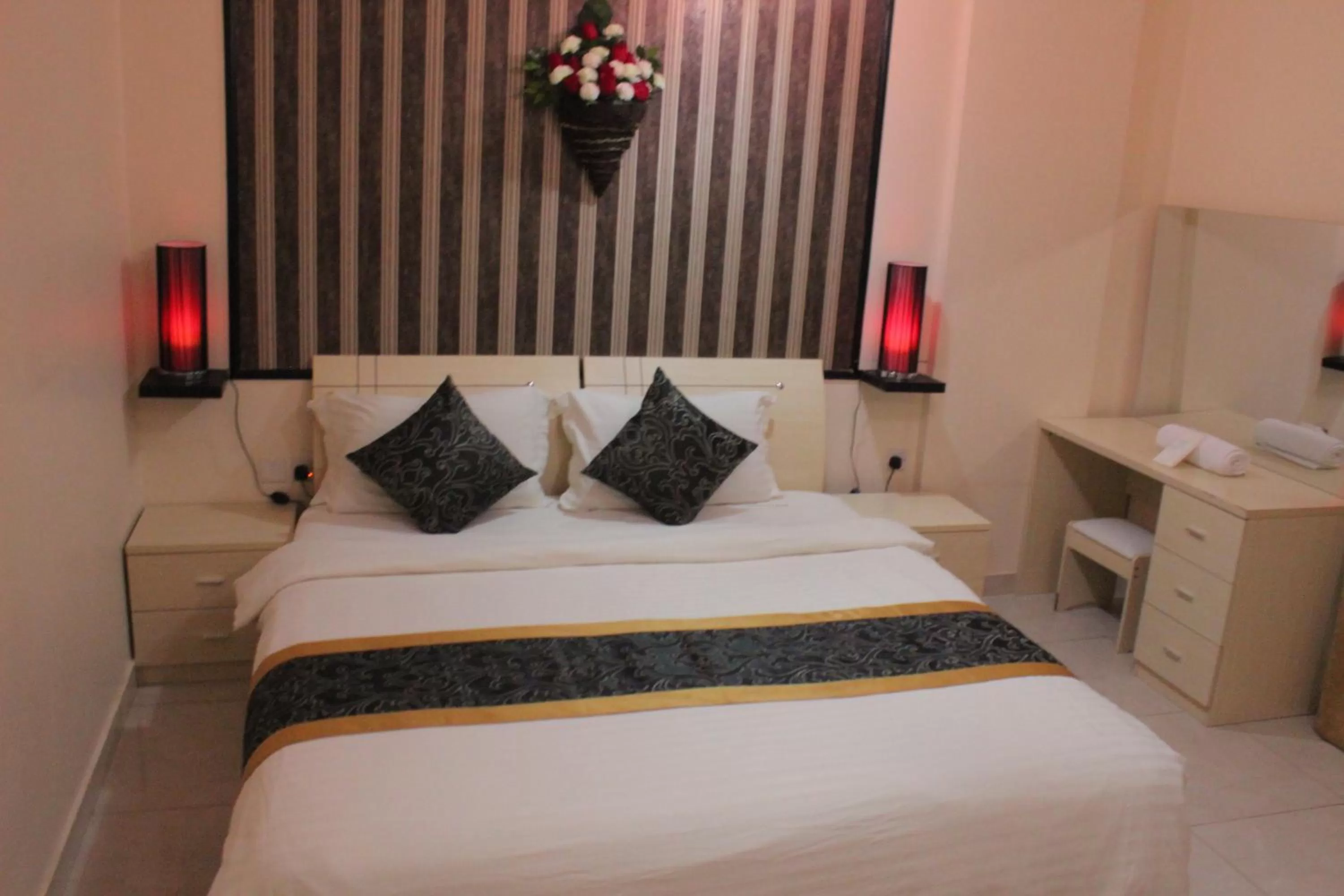 Bed in Al Amoria Apartments