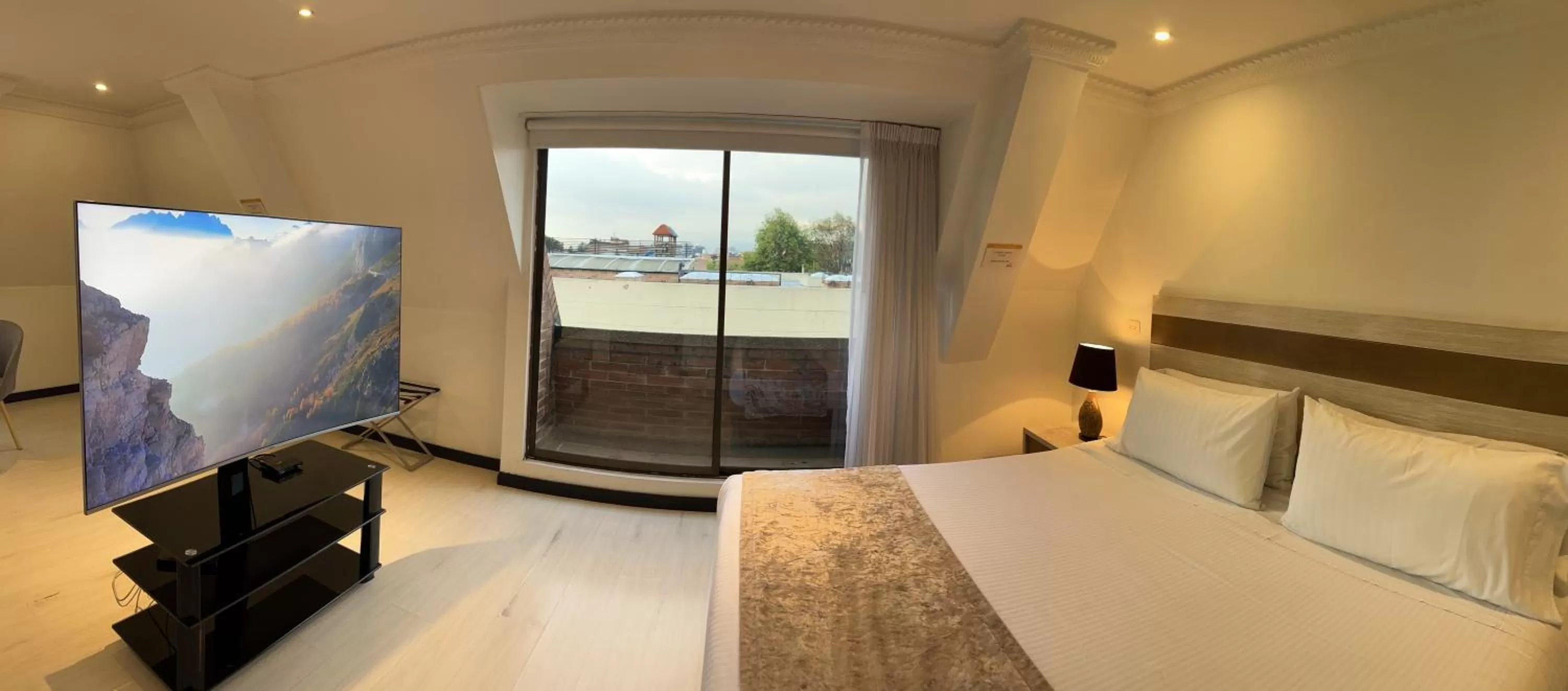 Photo of the whole room, Bed in Suites 109 GH Usaquén