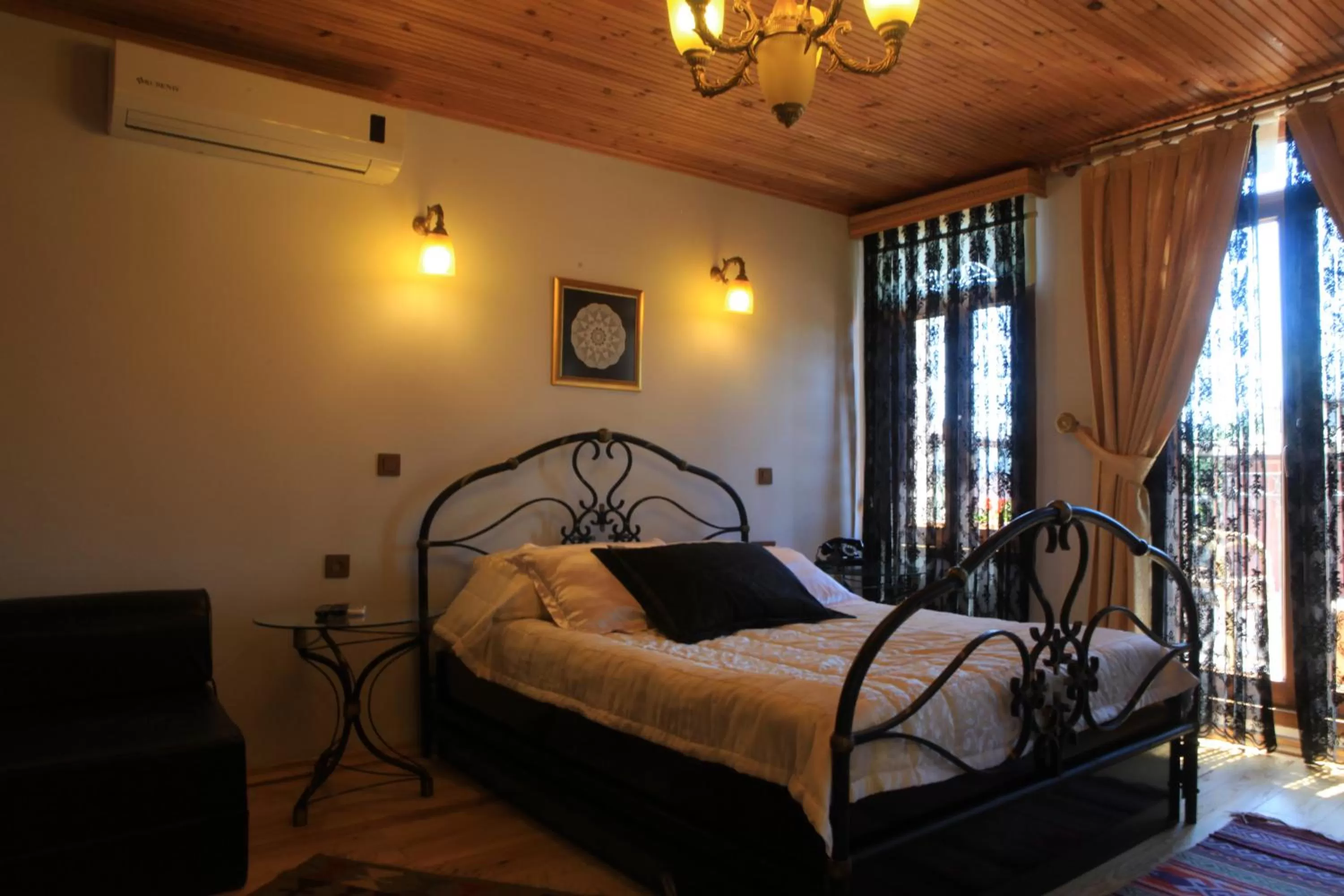 Photo of the whole room, Bed in Tom Square Boutique Hotel