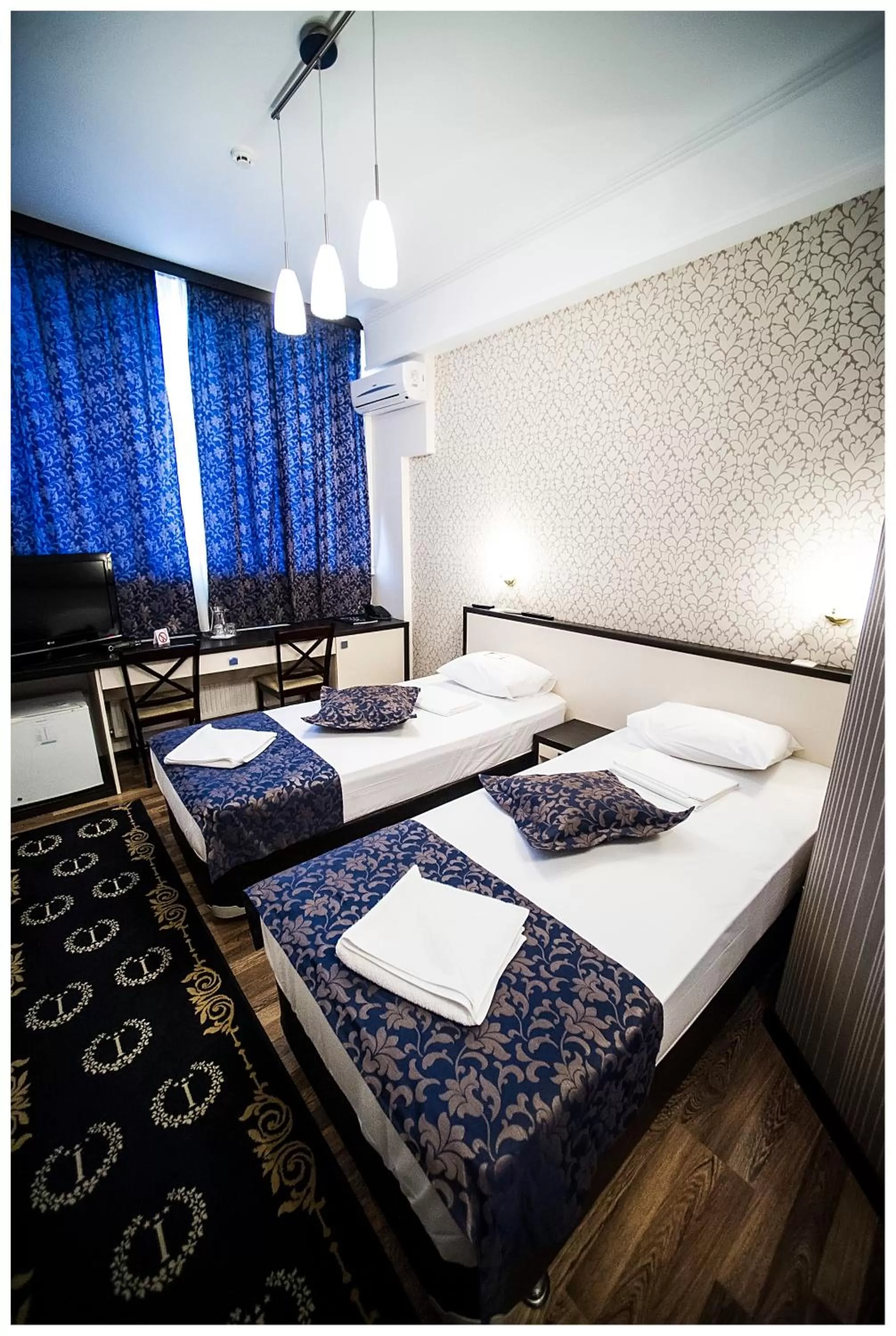 Photo of the whole room, Bed in IRIS Hotel