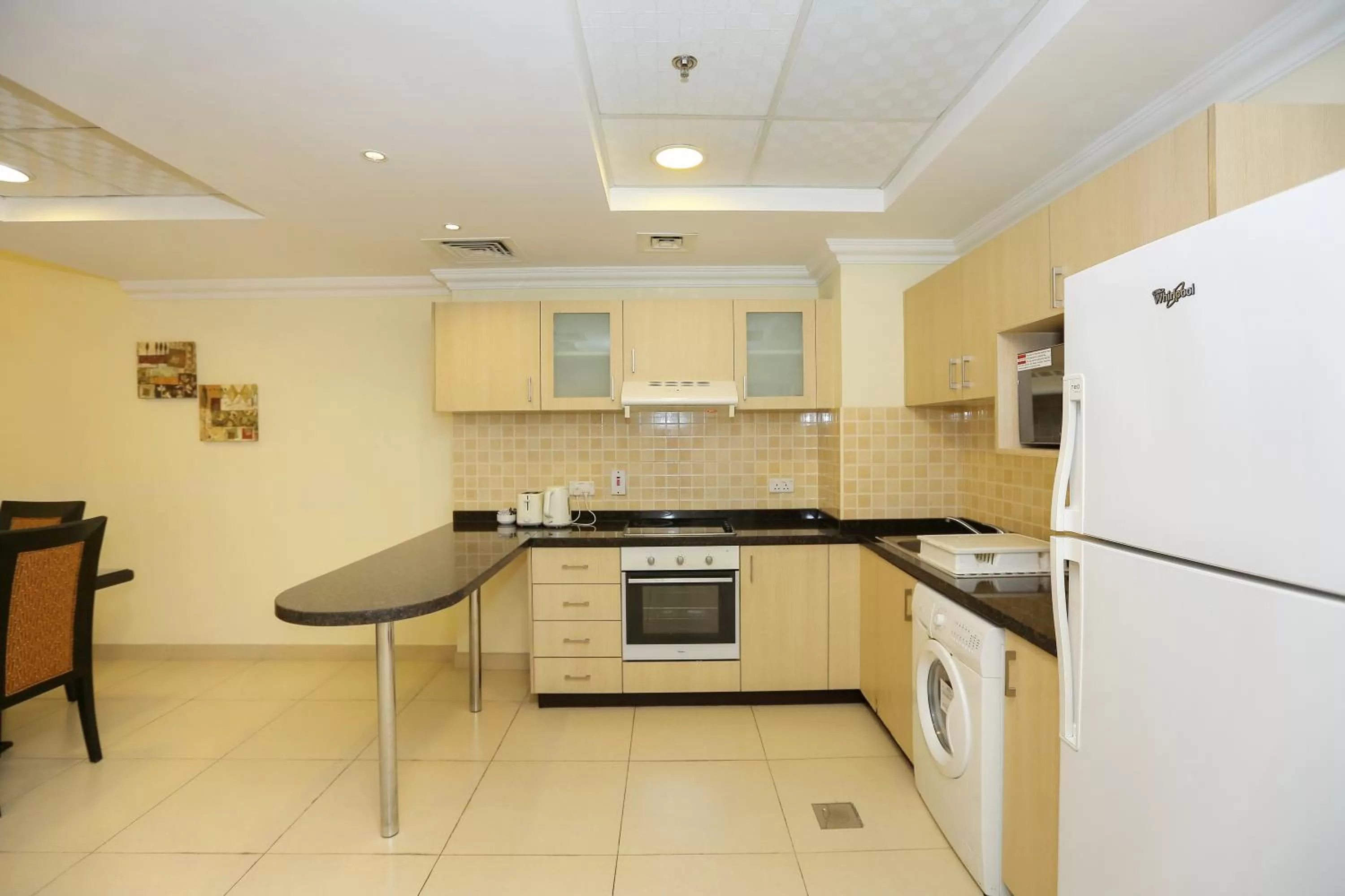 Kitchen or kitchenette in Ivory Grand Hotel Apartments