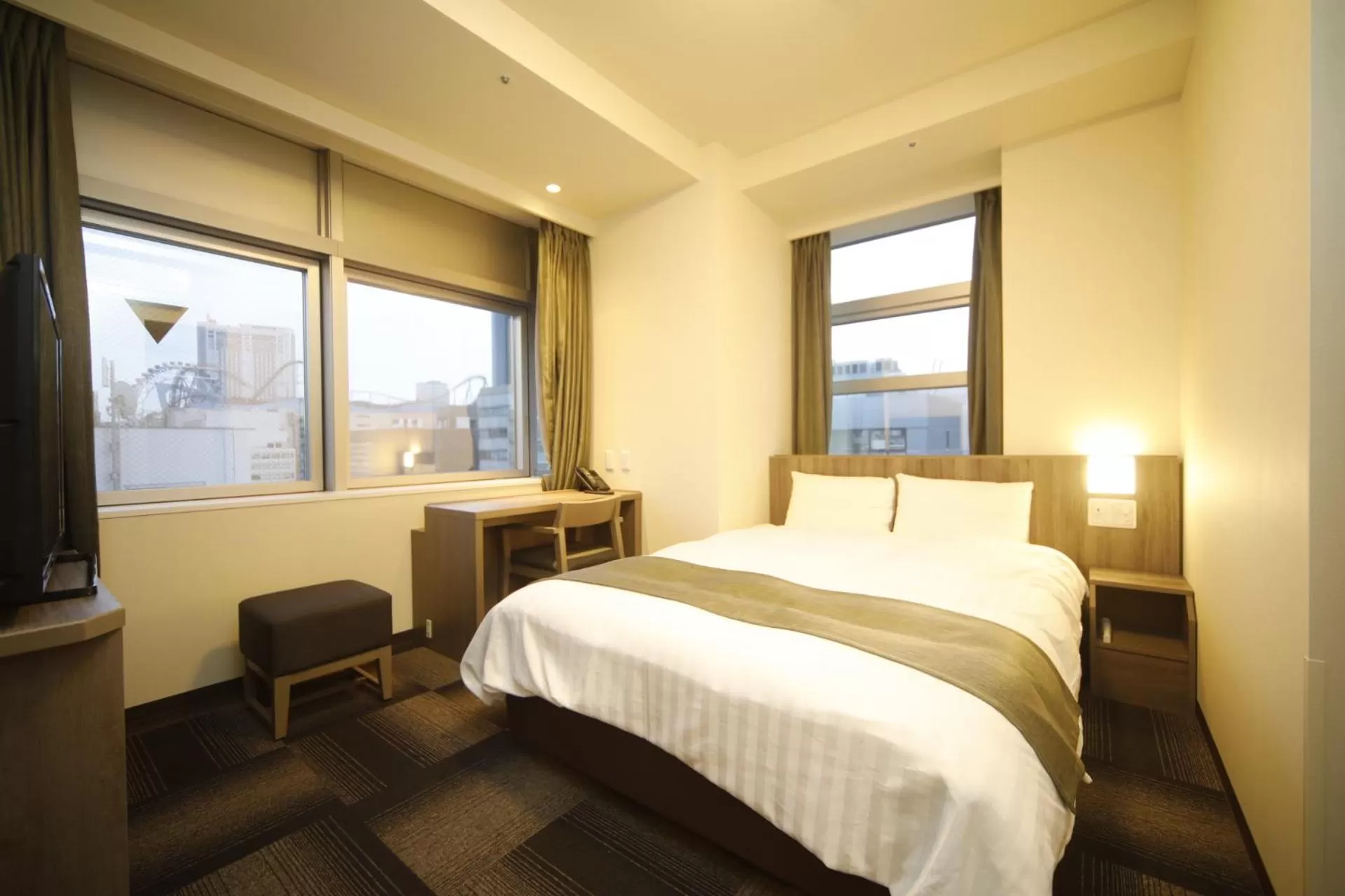 Bed in Dormy Inn Korakuen