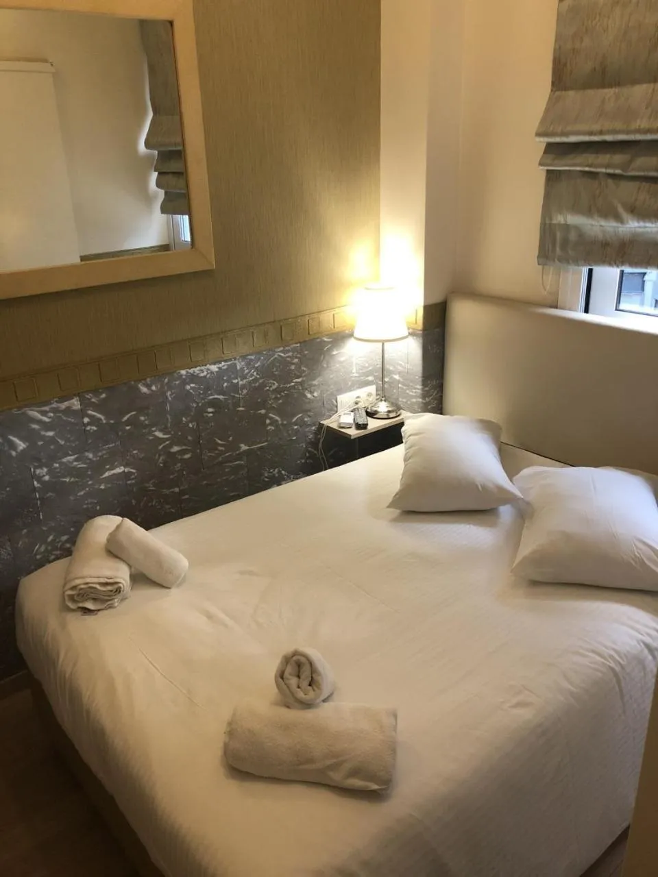 Bed in Phidias Hotel