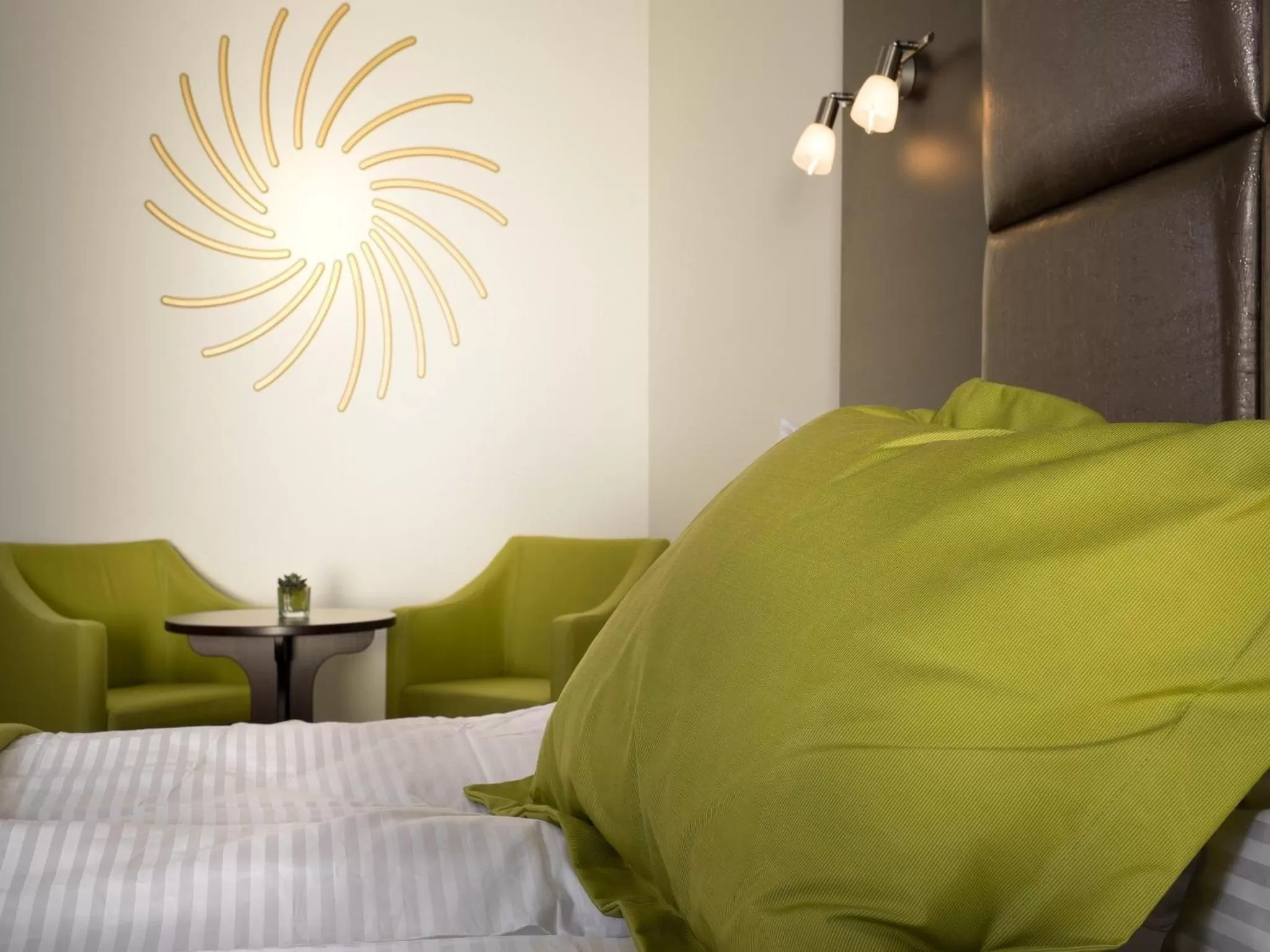 Bed in Boutique Hotel Bellevue Rheinfelden / Basel