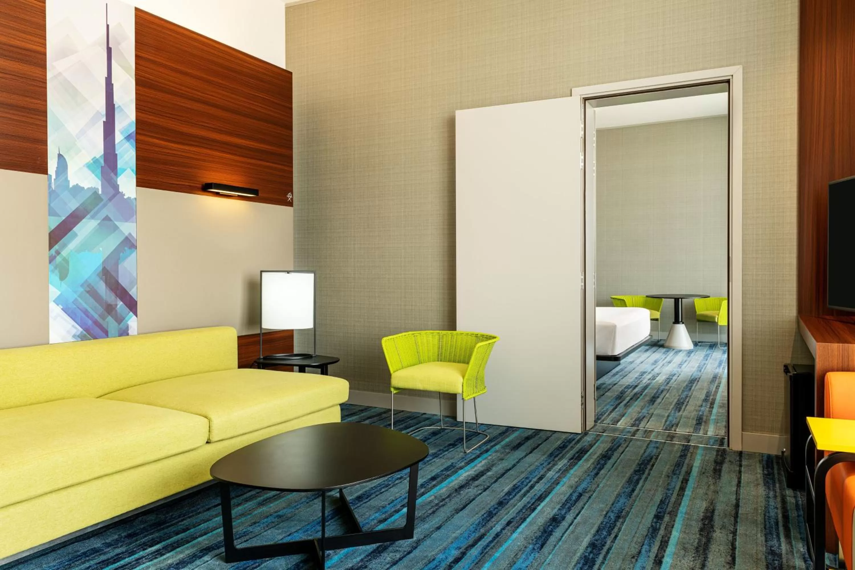 Living room, Bed in Aloft Dubai South