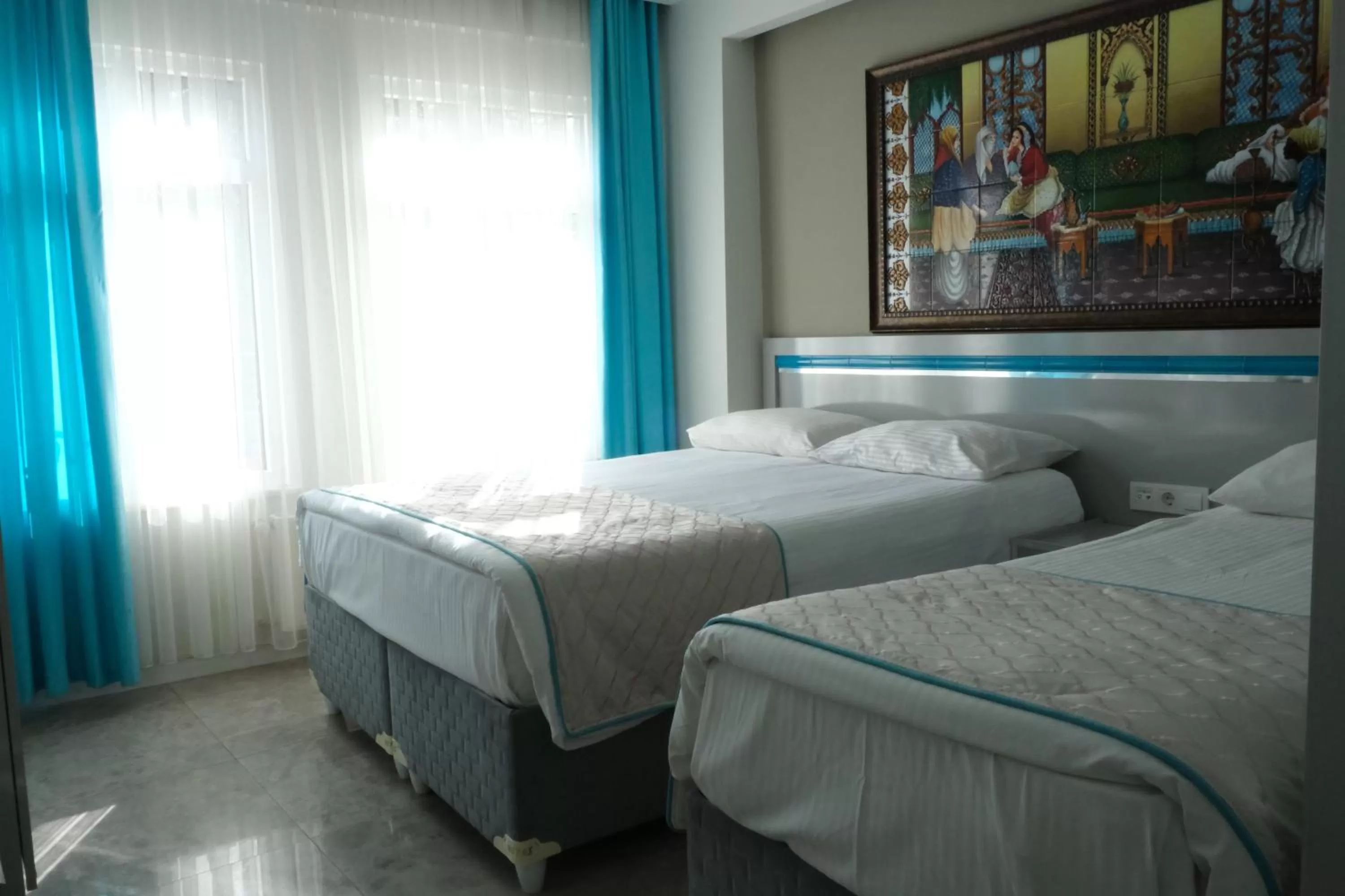 Bed in Star Holiday Hotel