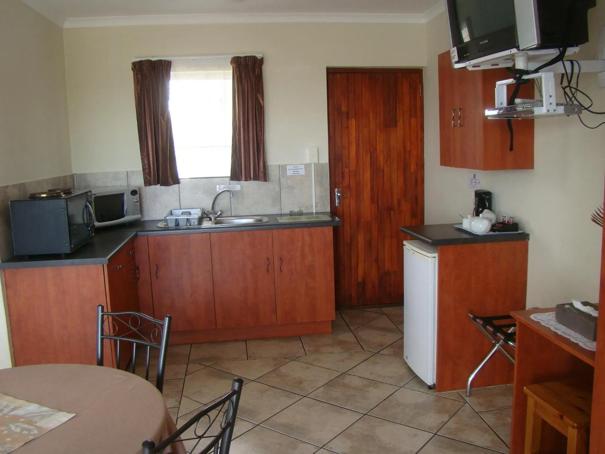 Kitchen or kitchenette in Aqua Marine Guest House