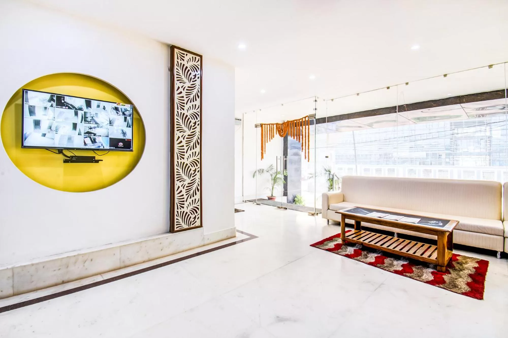 Seating area in FabHotel Grand Sheela