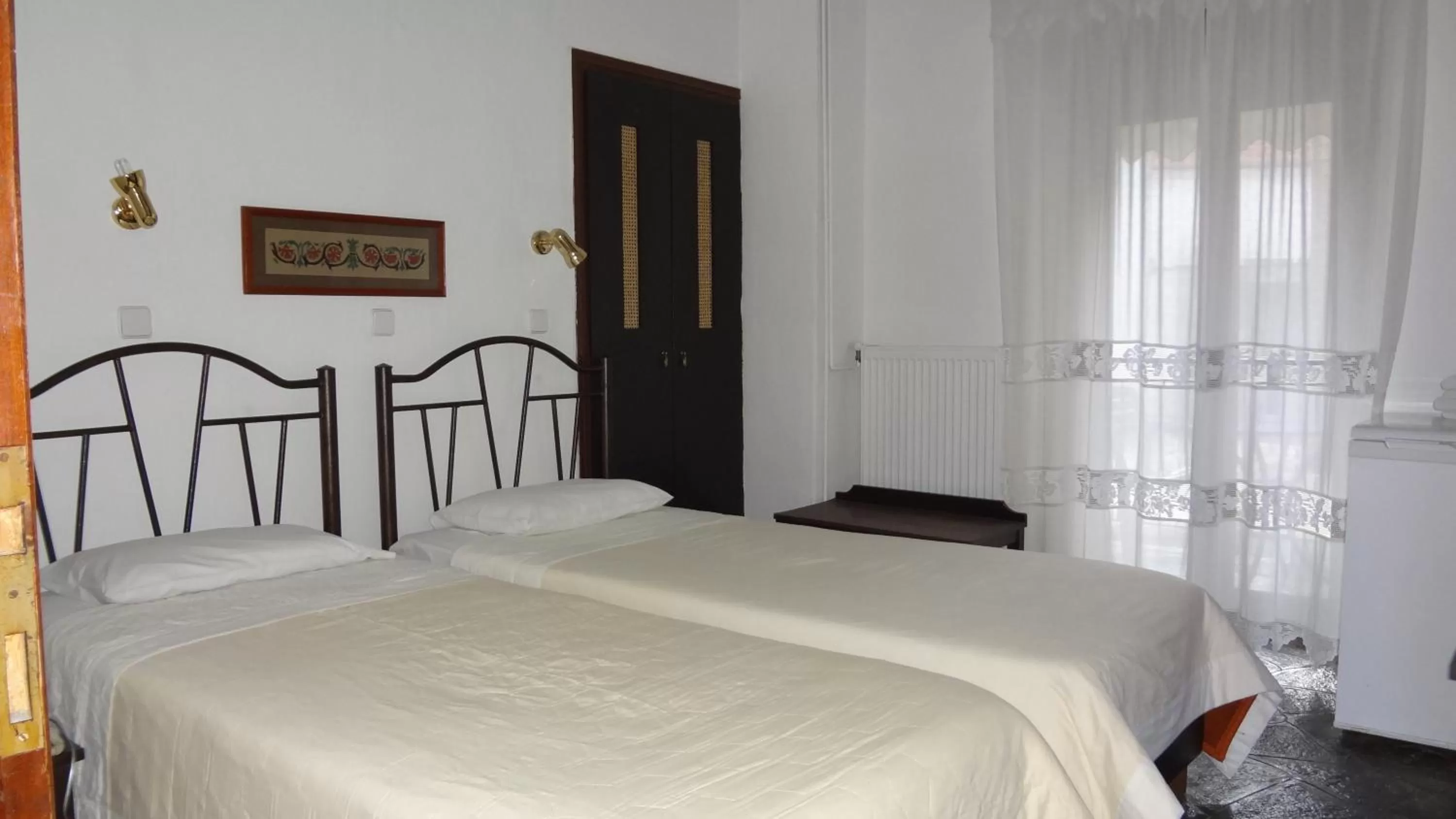 Bed in Acropolis Hotel