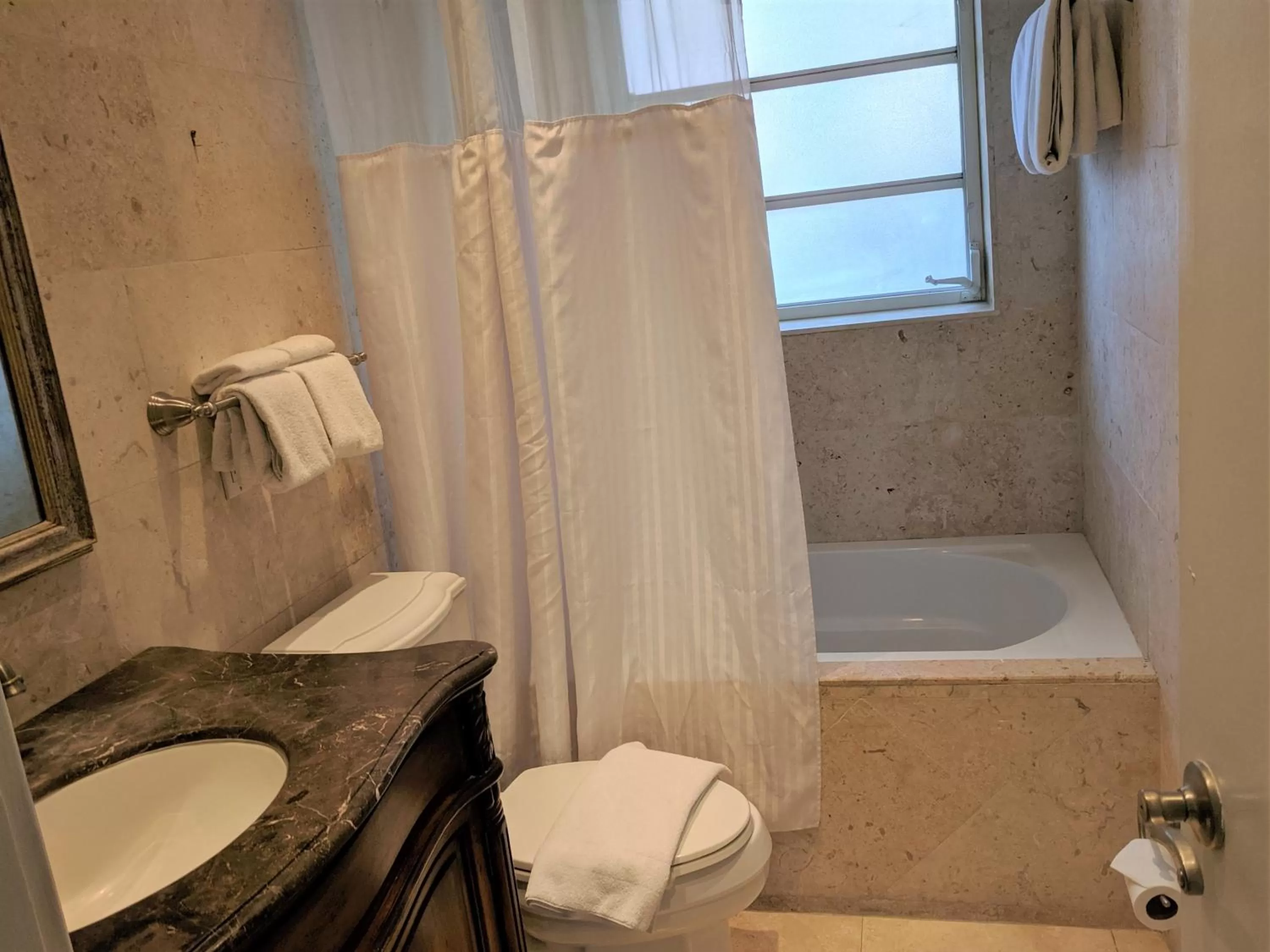 Shower in Manhattan Tower Apartment Hotel