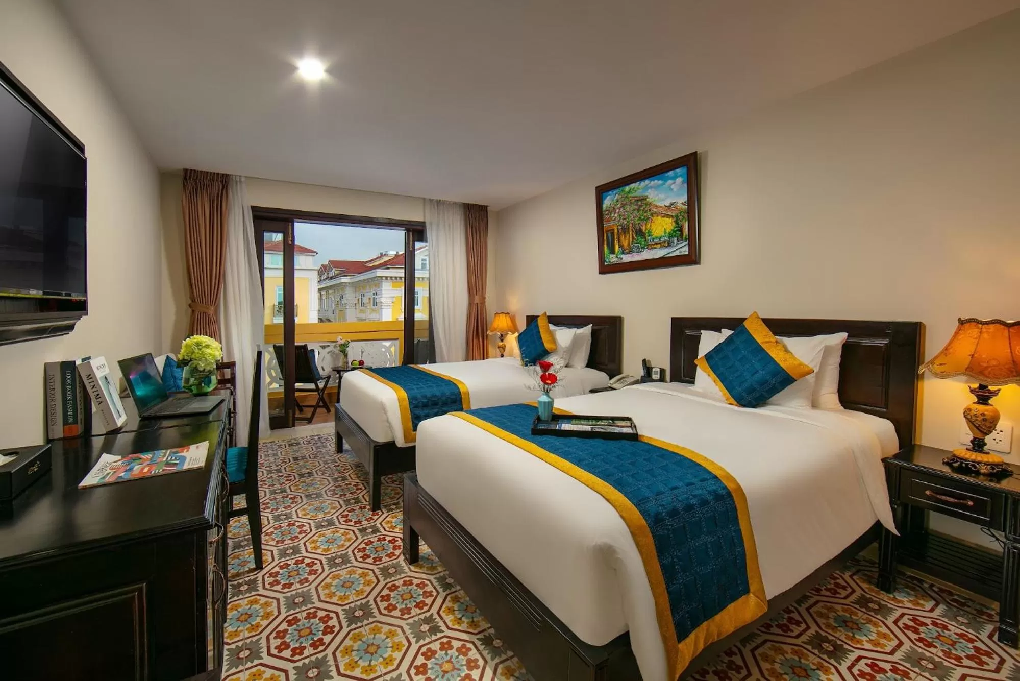 Bed in La Charm Hoi An Hotel & Spa