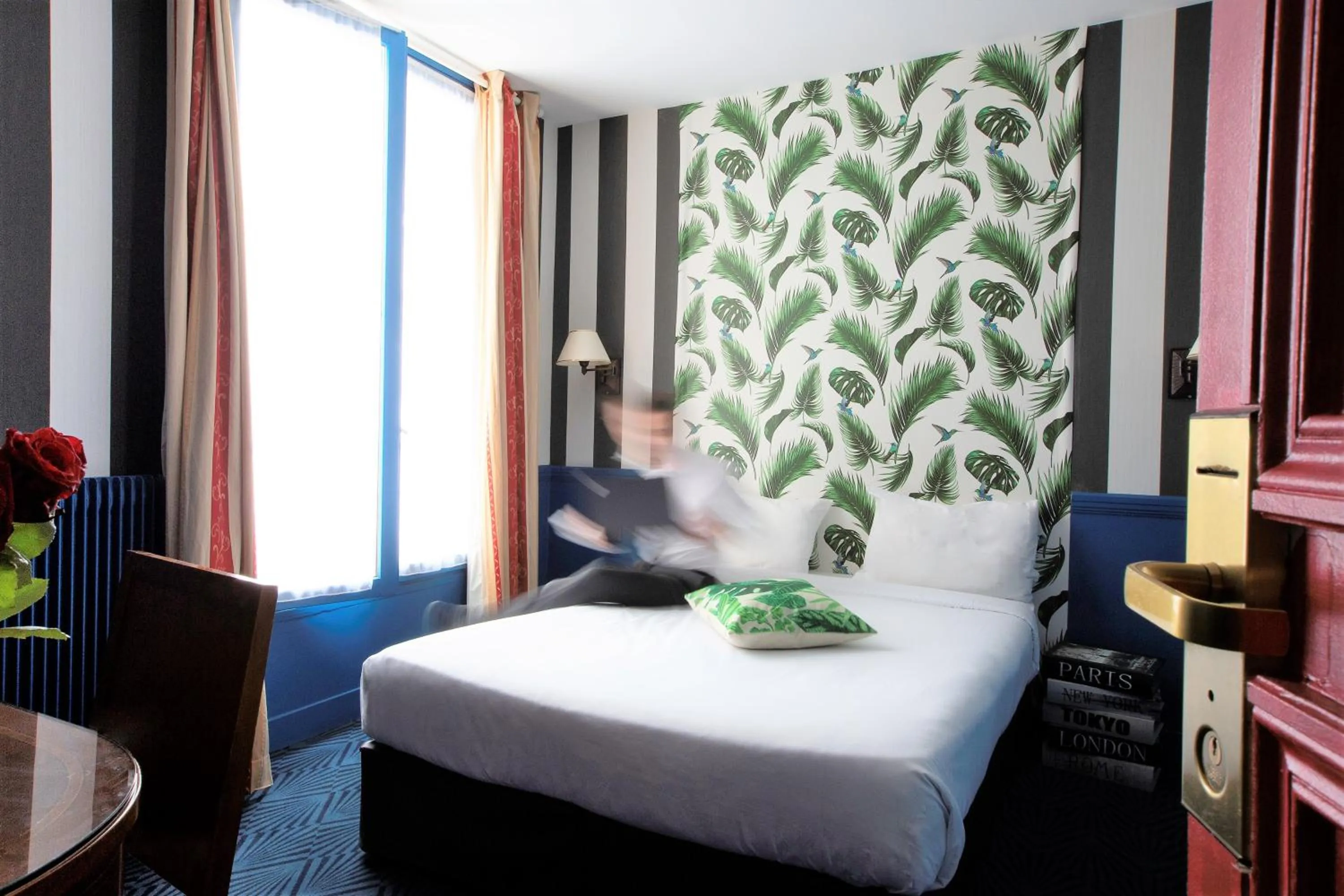 Photo of the whole room, Bed in Hôtel du Théâtre by Patrick Hayat