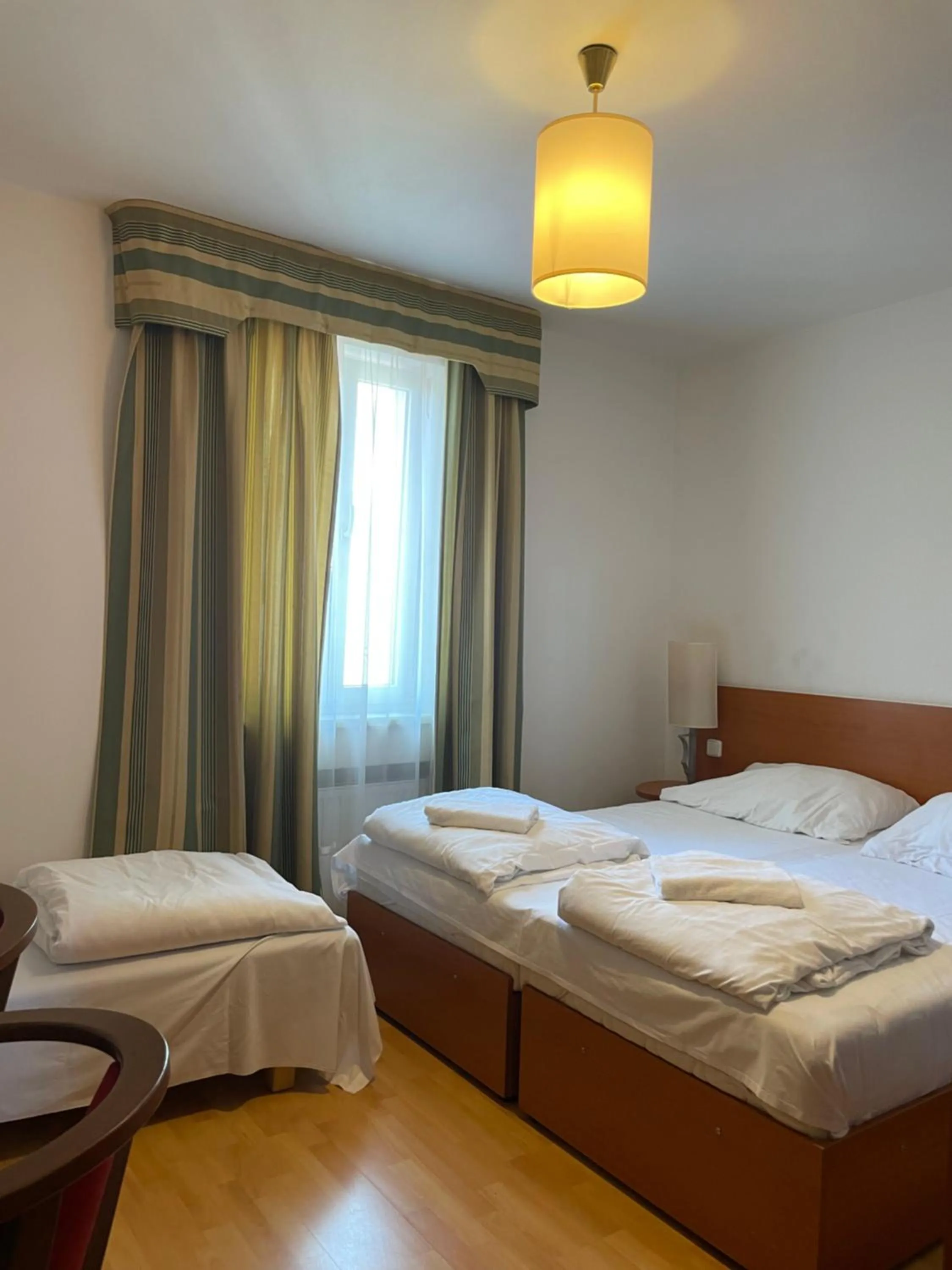 Bed in Gallery Hotel SIS