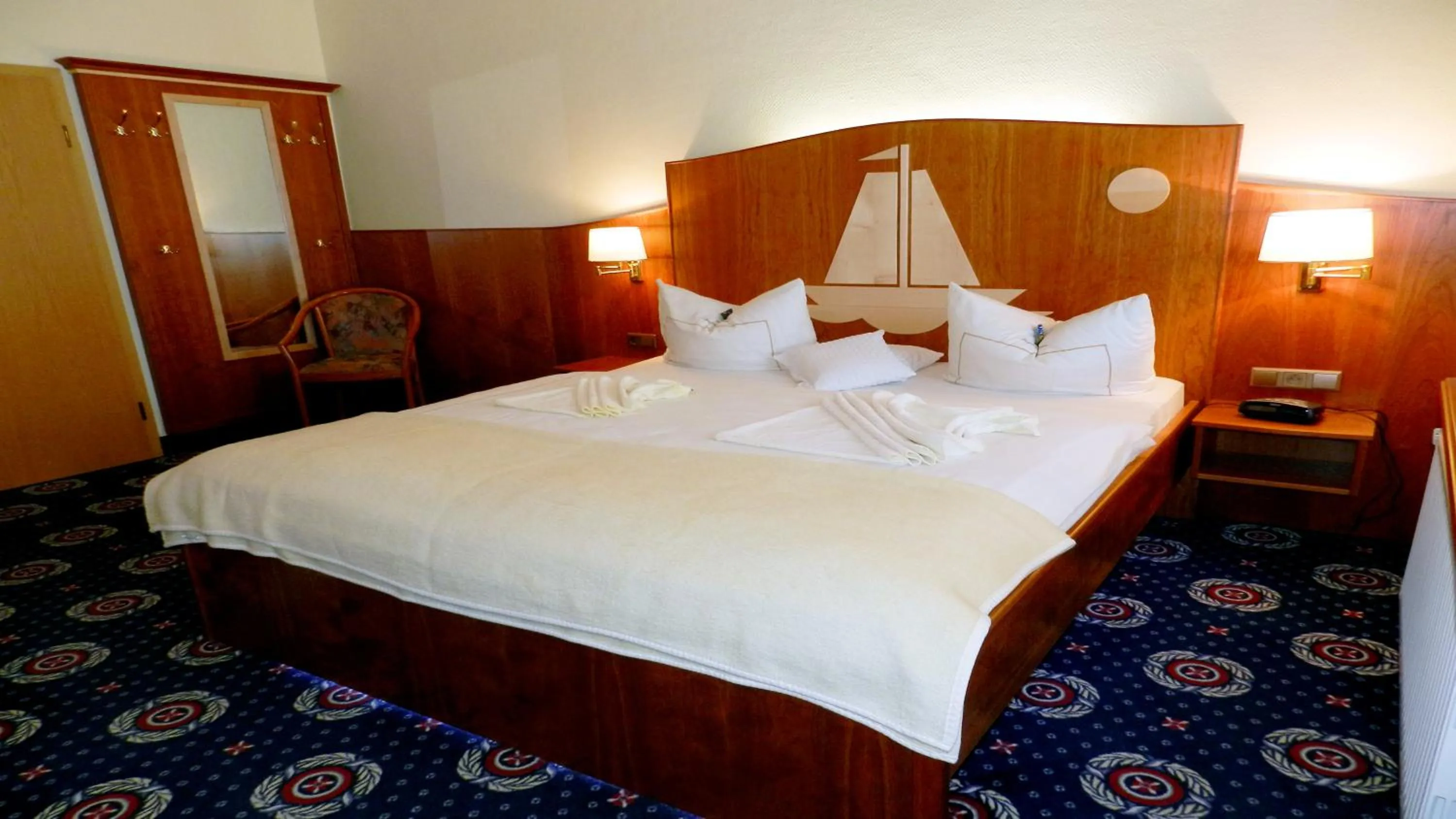 Bed in Hotel Deutsche Flagge