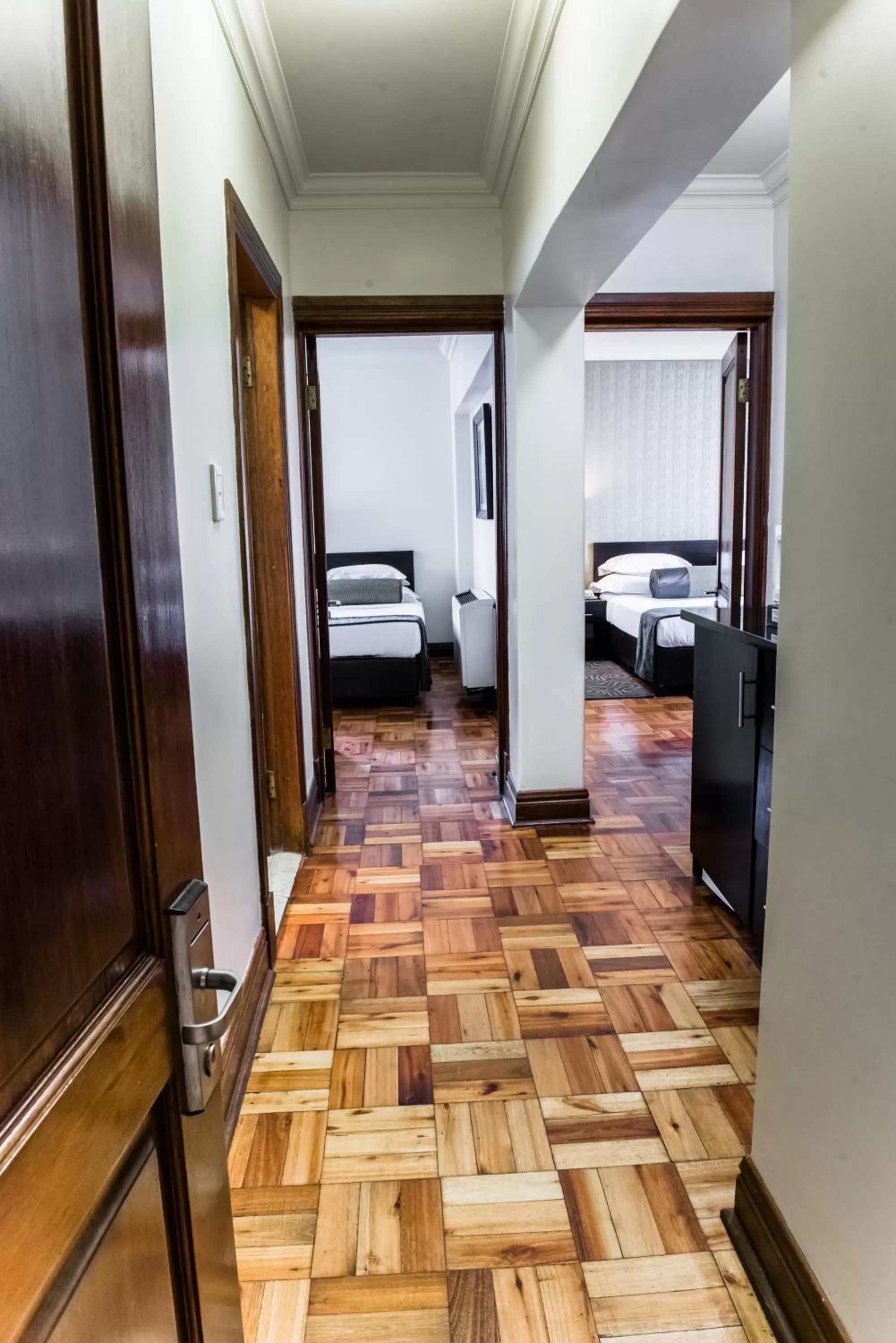 Decorative detail, Bed in Belaire Suites Hotel
