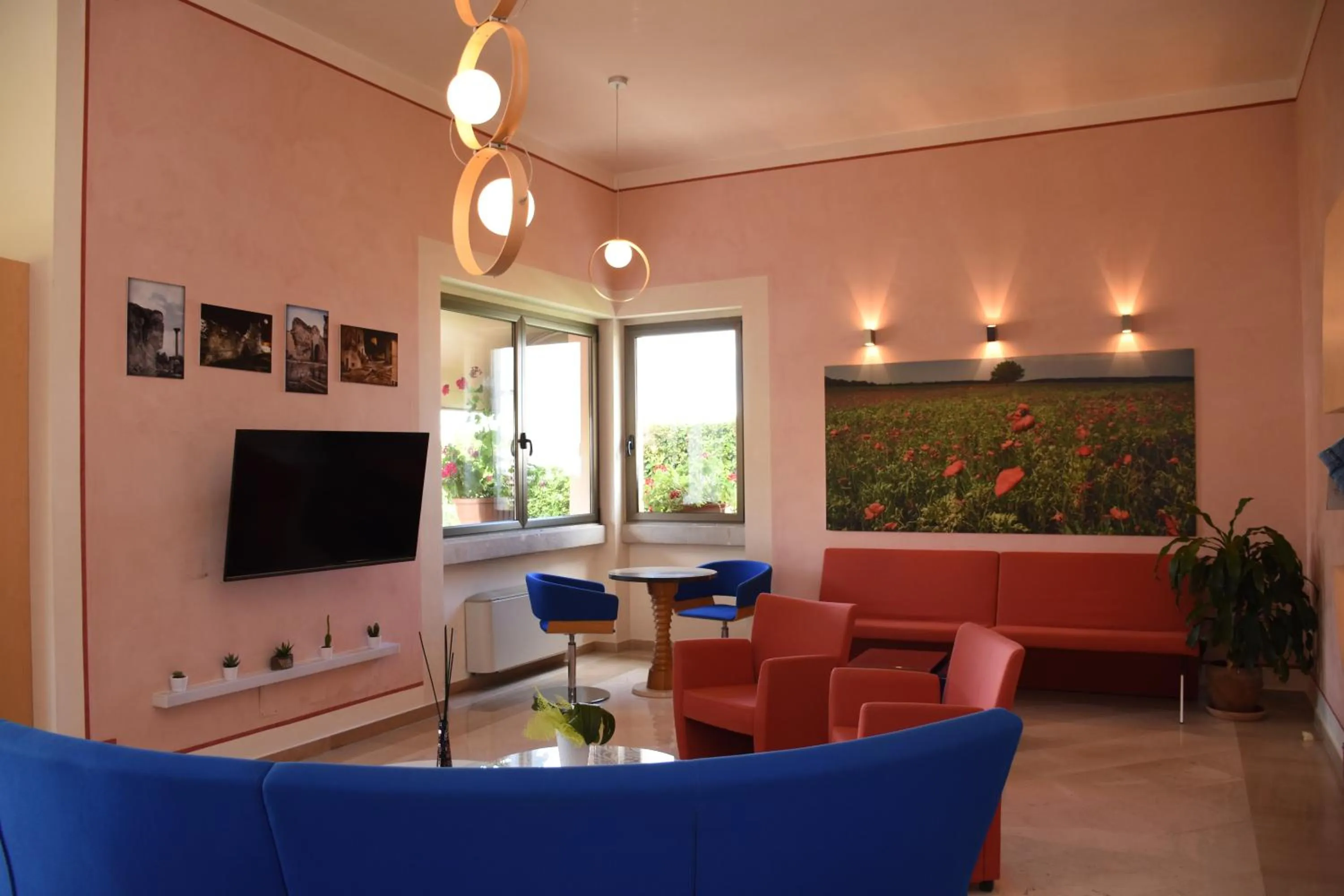 Communal lounge/ TV room in Hotel d'Altavilla