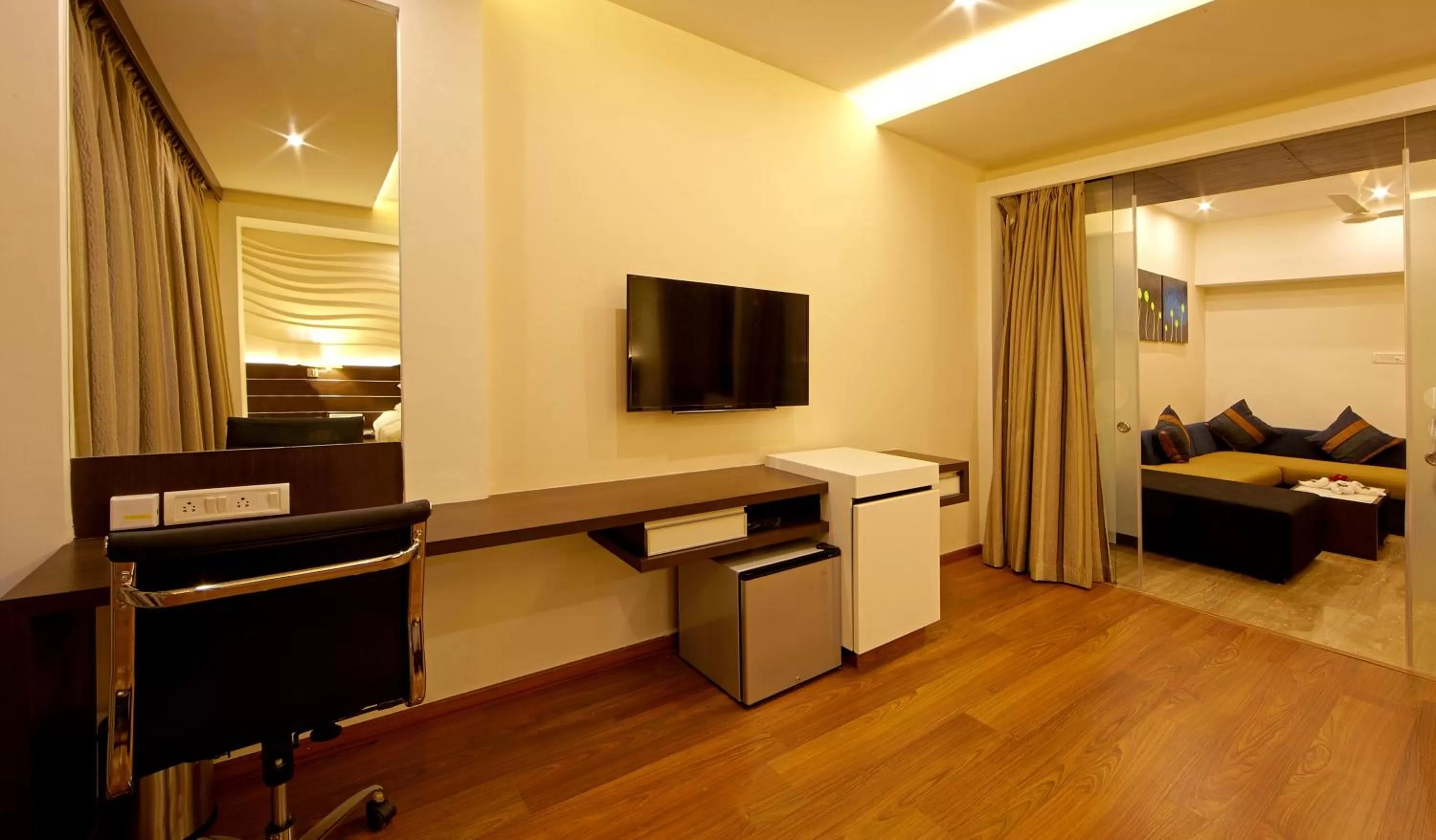 Living room, Bed in Golden Fruits Business Suites